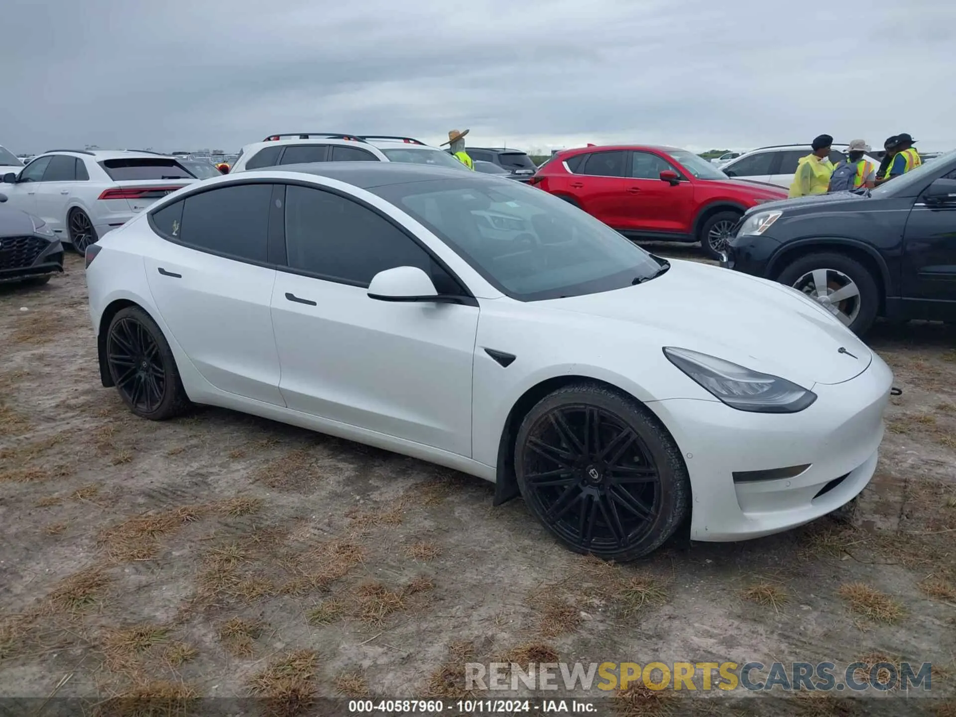 1 Photograph of a damaged car 5YJ3E1EA6MF852477 TESLA MODEL 3 2021