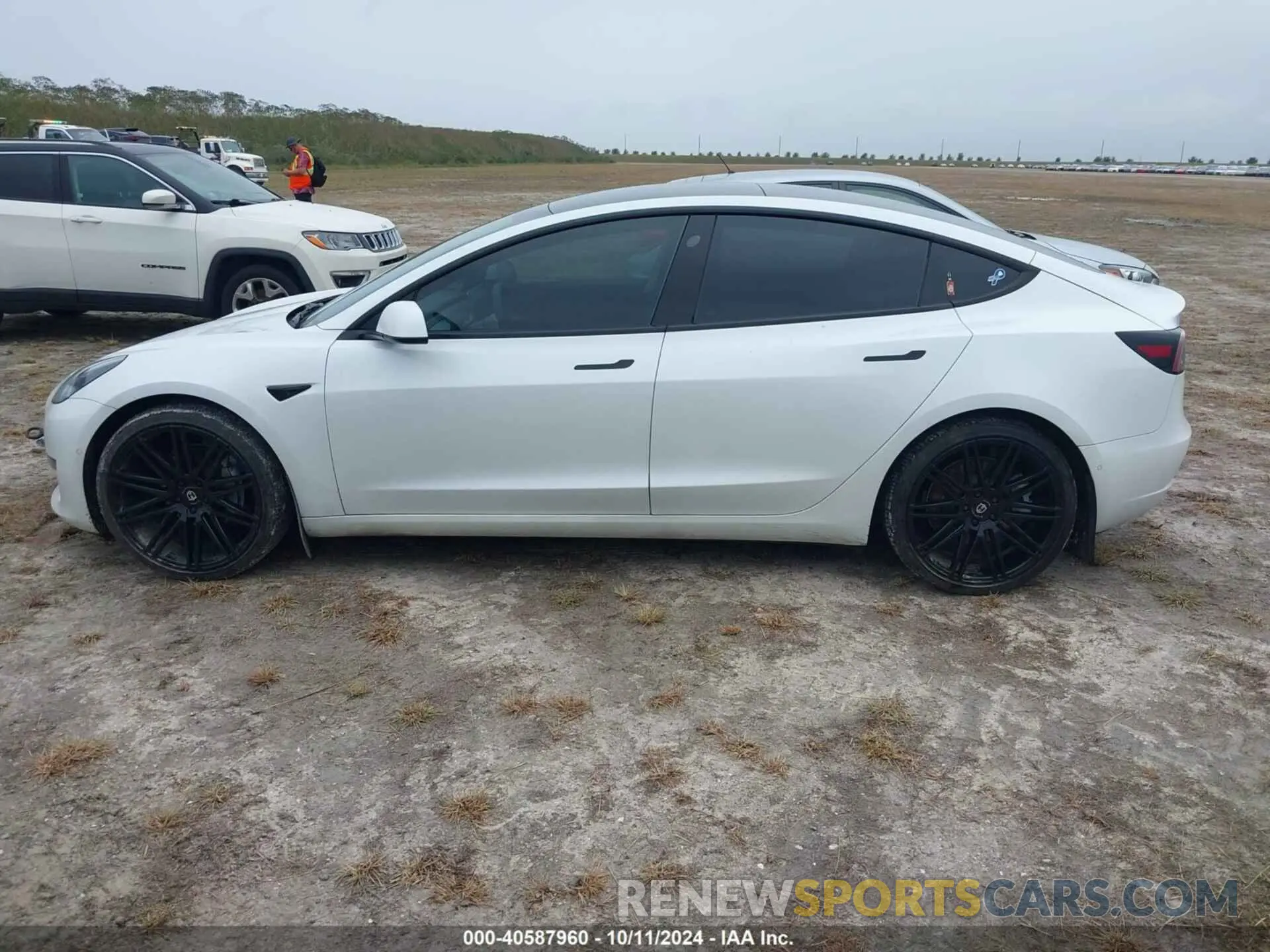 14 Photograph of a damaged car 5YJ3E1EA6MF852477 TESLA MODEL 3 2021