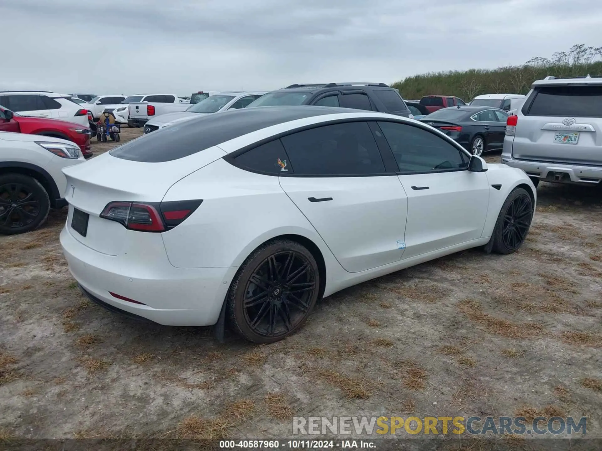 4 Photograph of a damaged car 5YJ3E1EA6MF852477 TESLA MODEL 3 2021