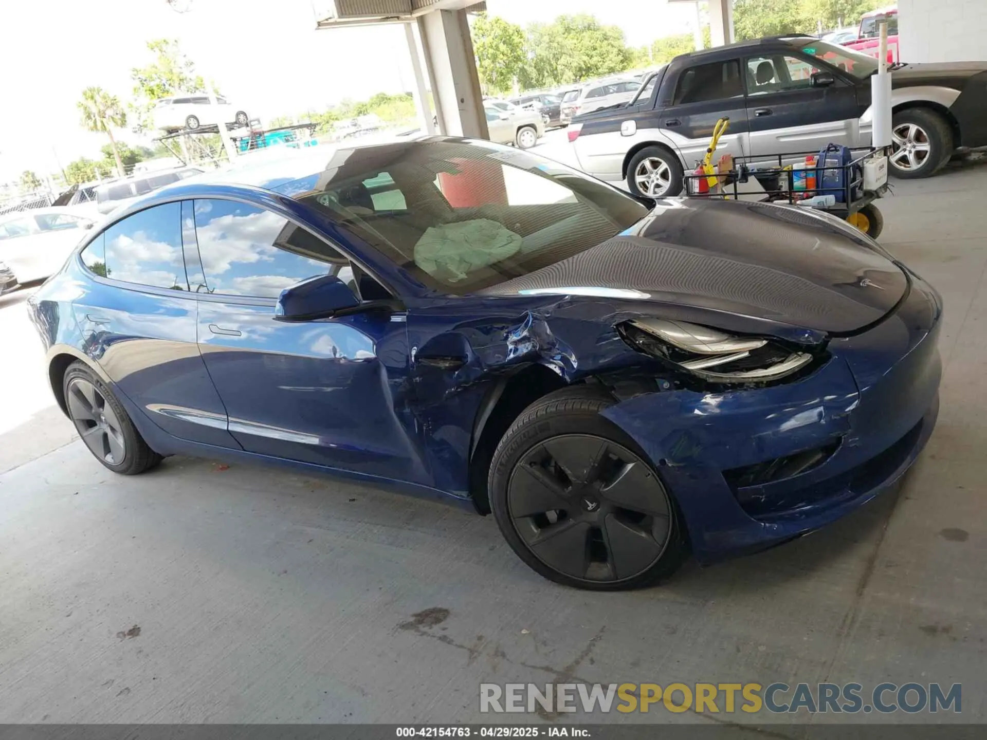 12 Photograph of a damaged car 5YJ3E1EA6MF860949 TESLA MODEL 3 2021