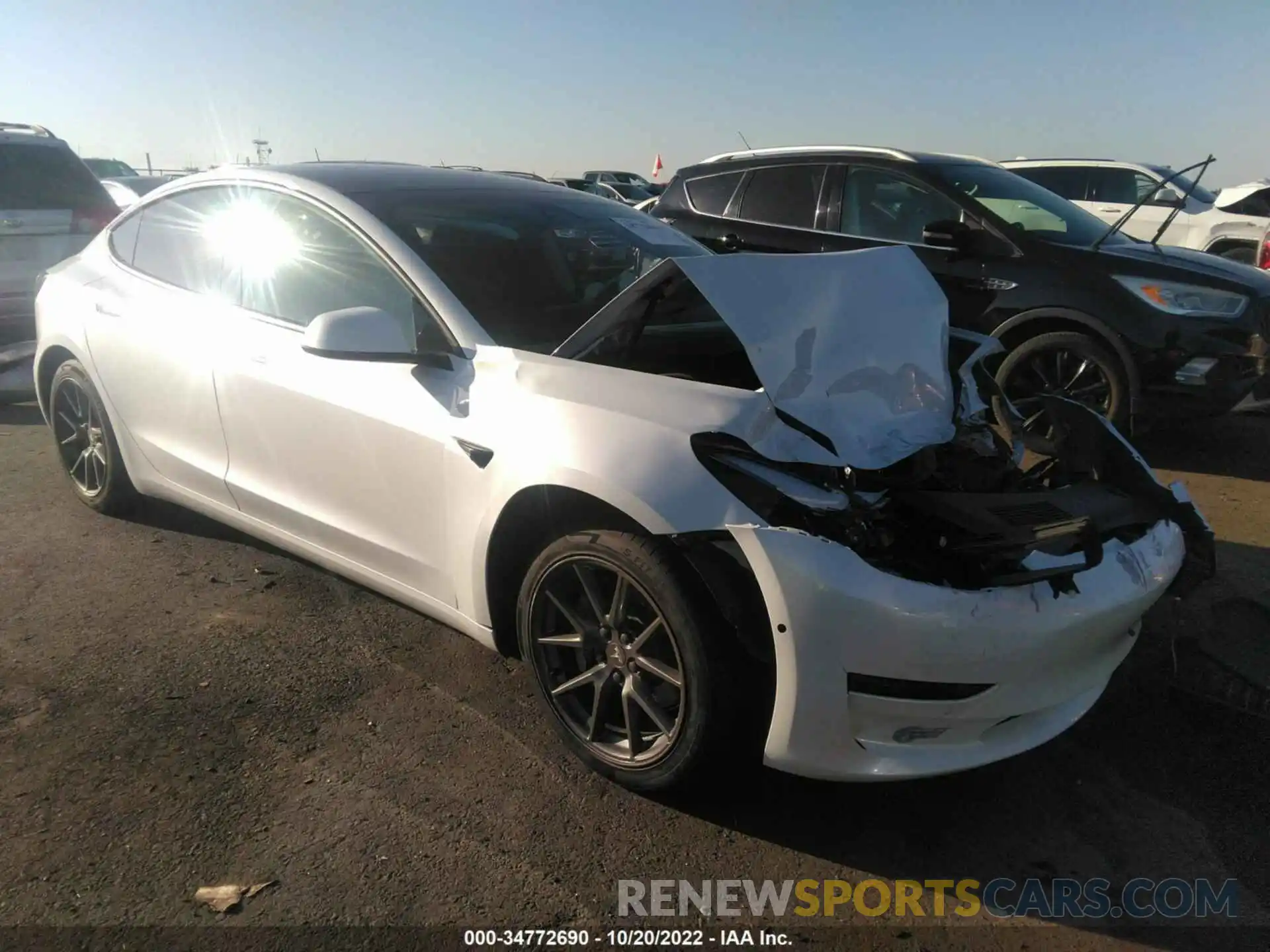 1 Photograph of a damaged car 5YJ3E1EA6MF874012 TESLA MODEL 3 2021