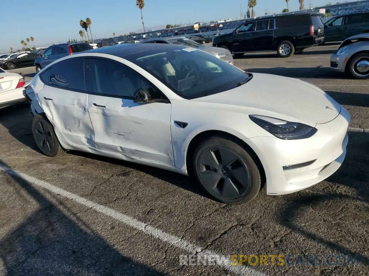 4 Photograph of a damaged car 5YJ3E1EA6MF929669 TESLA MODEL 3 2021