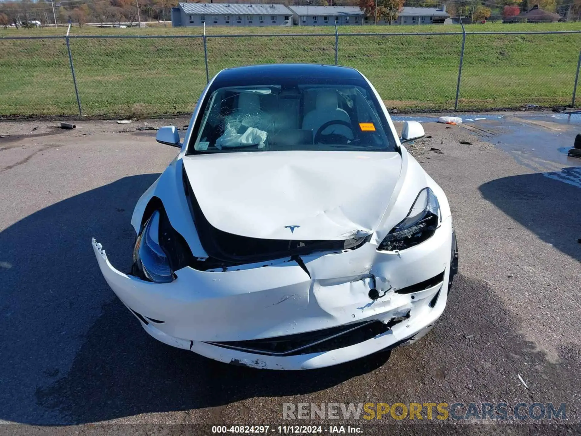 12 Photograph of a damaged car 5YJ3E1EA6MF978497 TESLA MODEL 3 2021