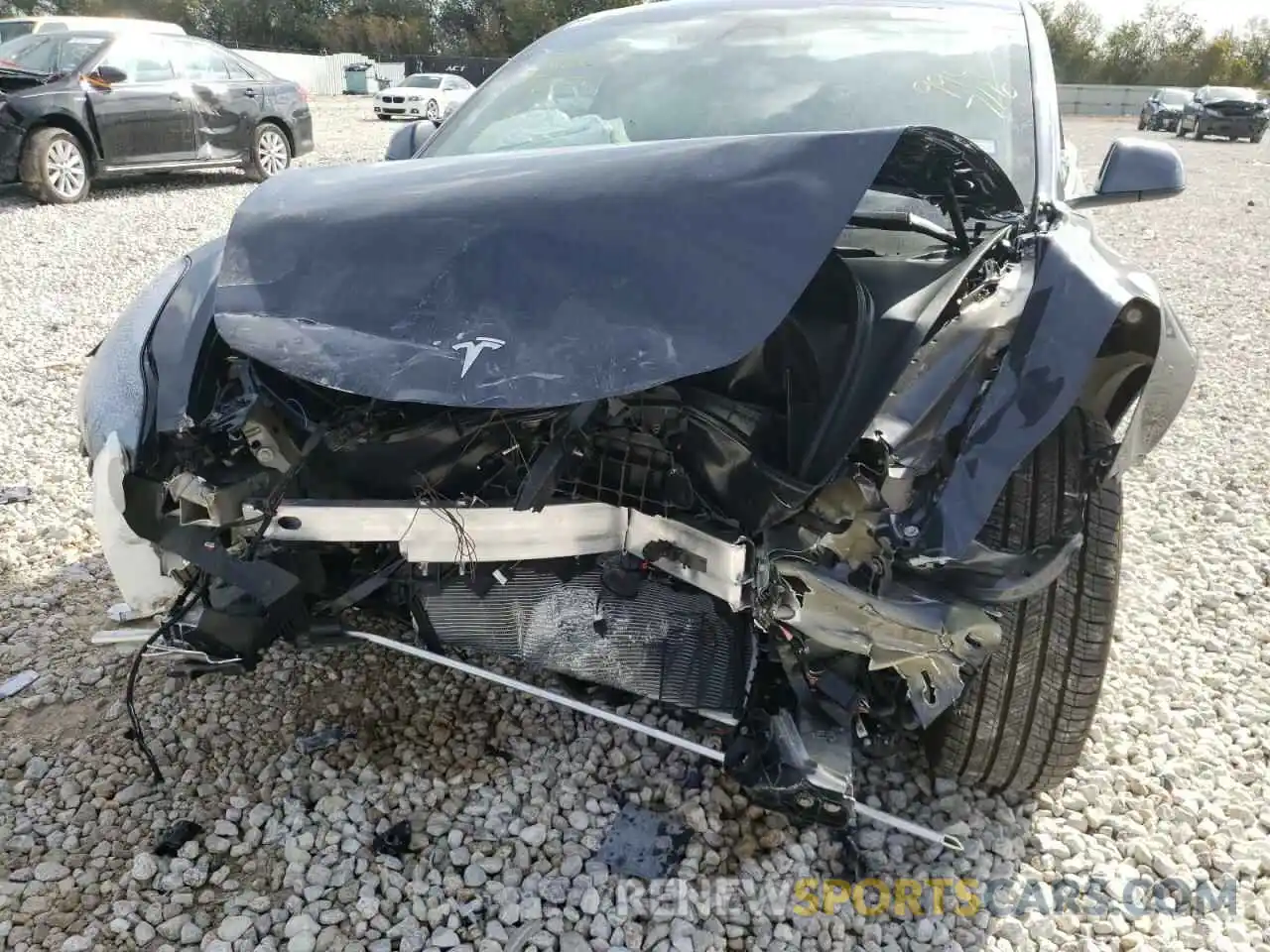 9 Photograph of a damaged car 5YJ3E1EA6MF994716 TESLA MODEL 3 2021