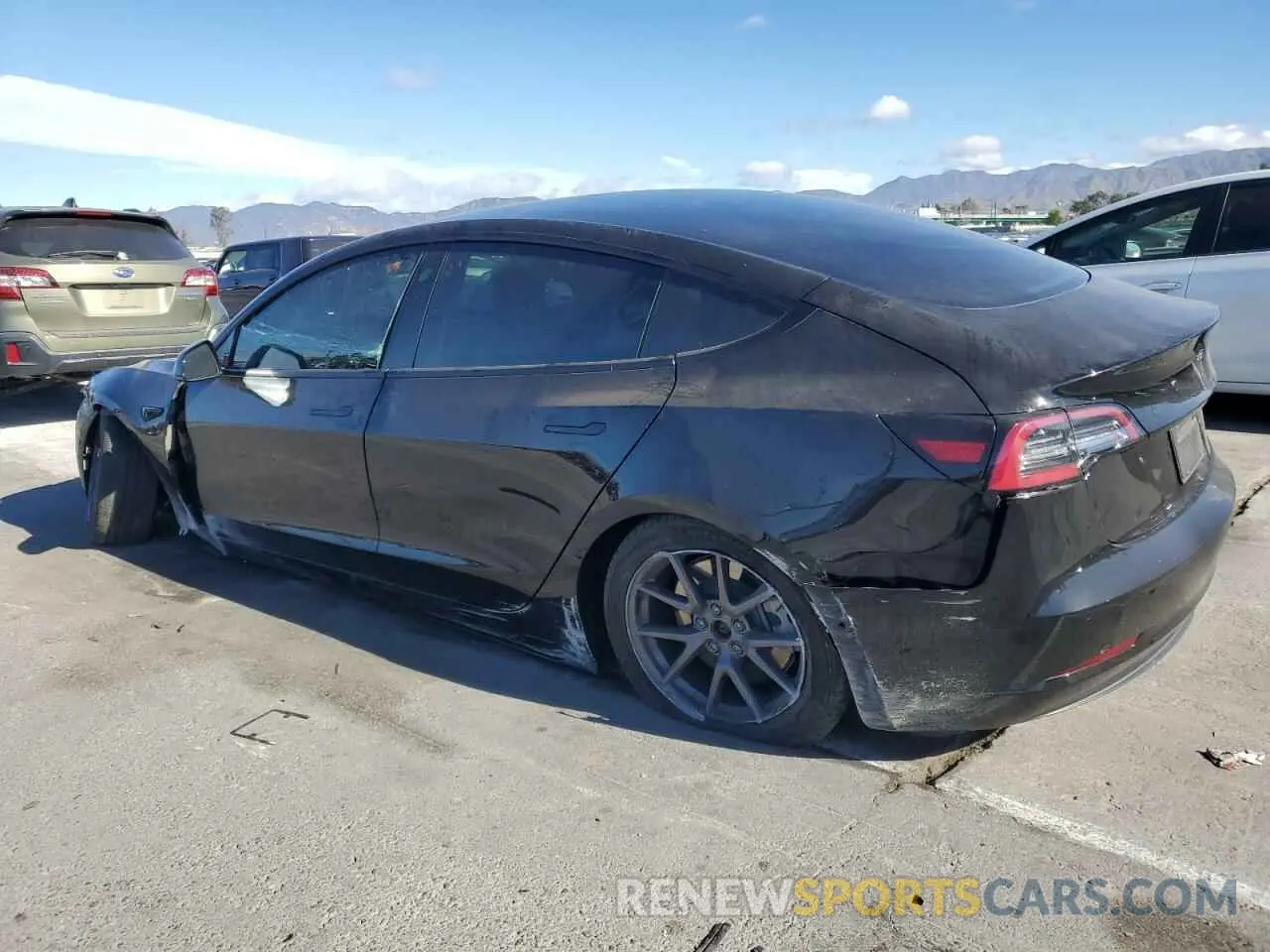 2 Photograph of a damaged car 5YJ3E1EA6MF998796 TESLA MODEL 3 2021