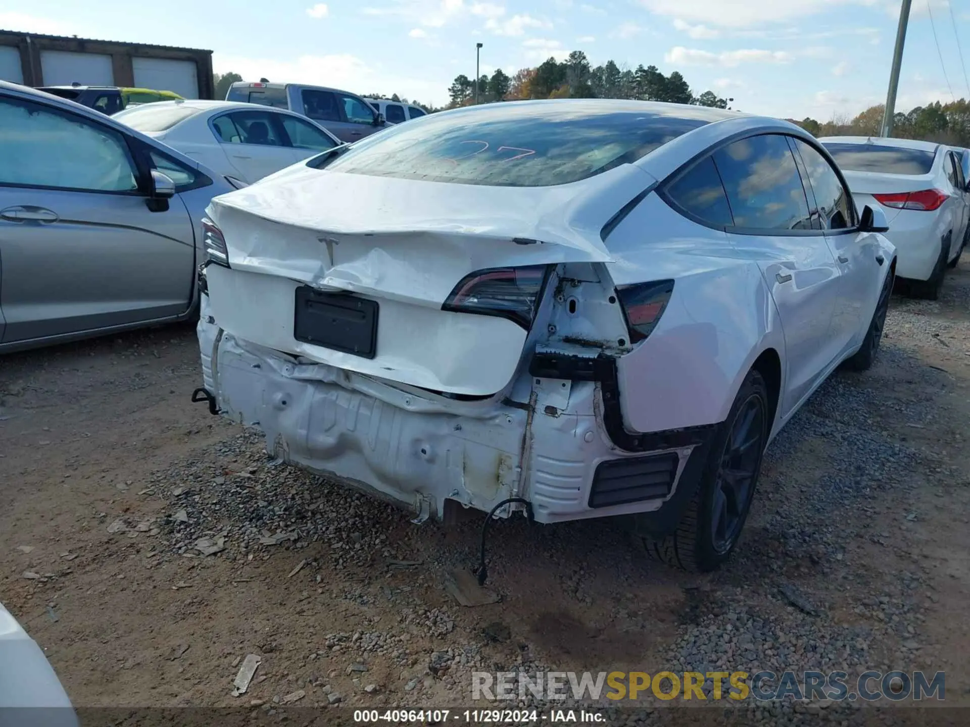 4 Photograph of a damaged car 5YJ3E1EA7MF018363 TESLA MODEL 3 2021