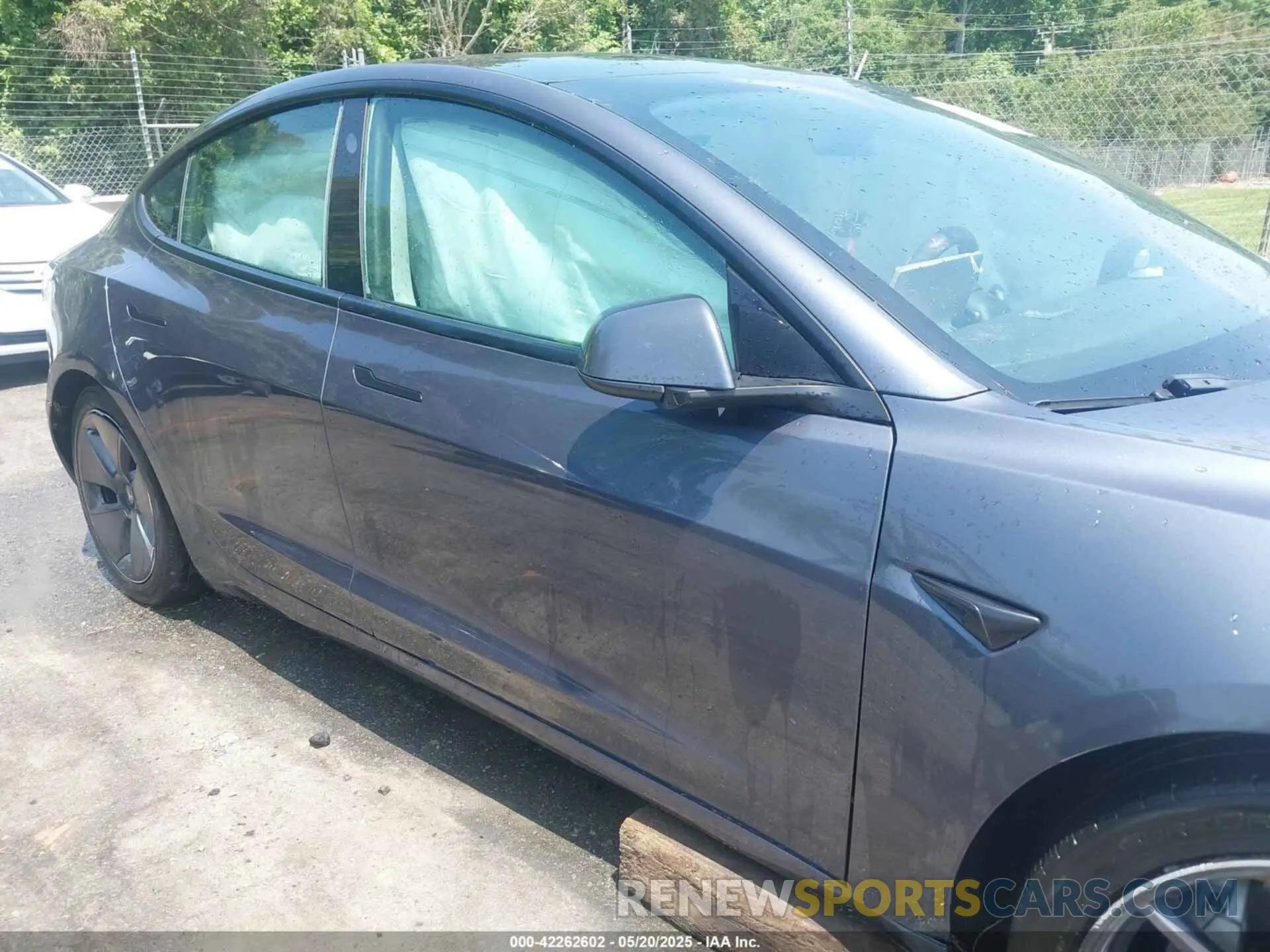 12 Photograph of a damaged car 5YJ3E1EA7MF088283 TESLA MODEL 3 2021