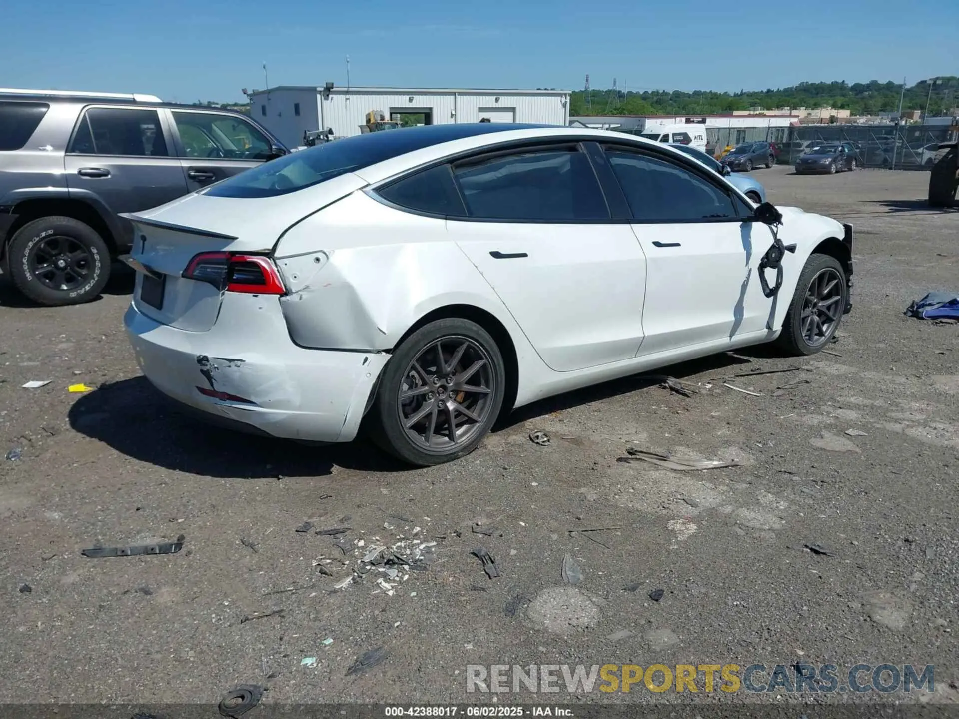 4 Photograph of a damaged car 5YJ3E1EA7MF853671 TESLA MODEL 3 2021