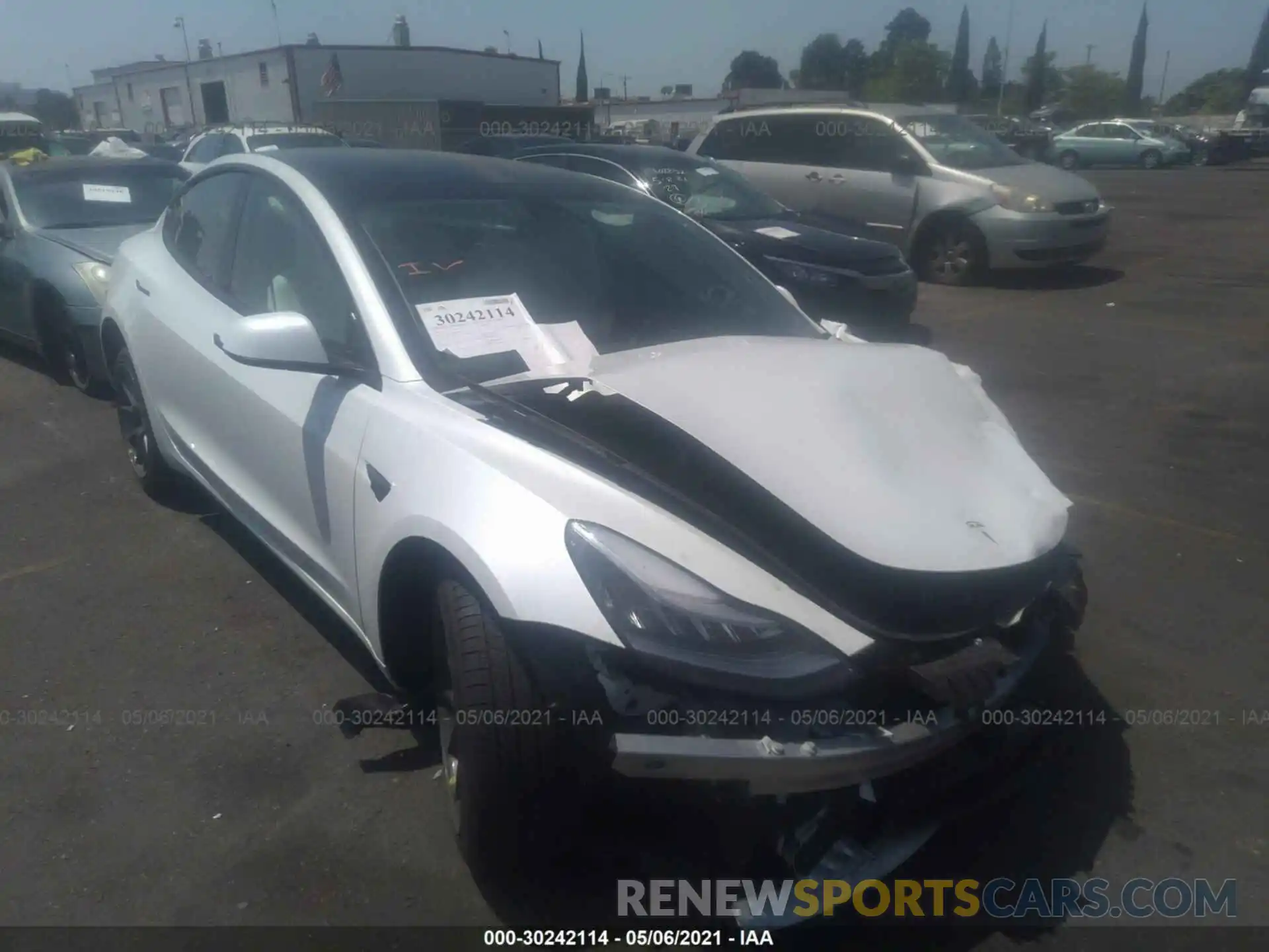 1 Photograph of a damaged car 5YJ3E1EA7MF858871 TESLA MODEL 3 2021