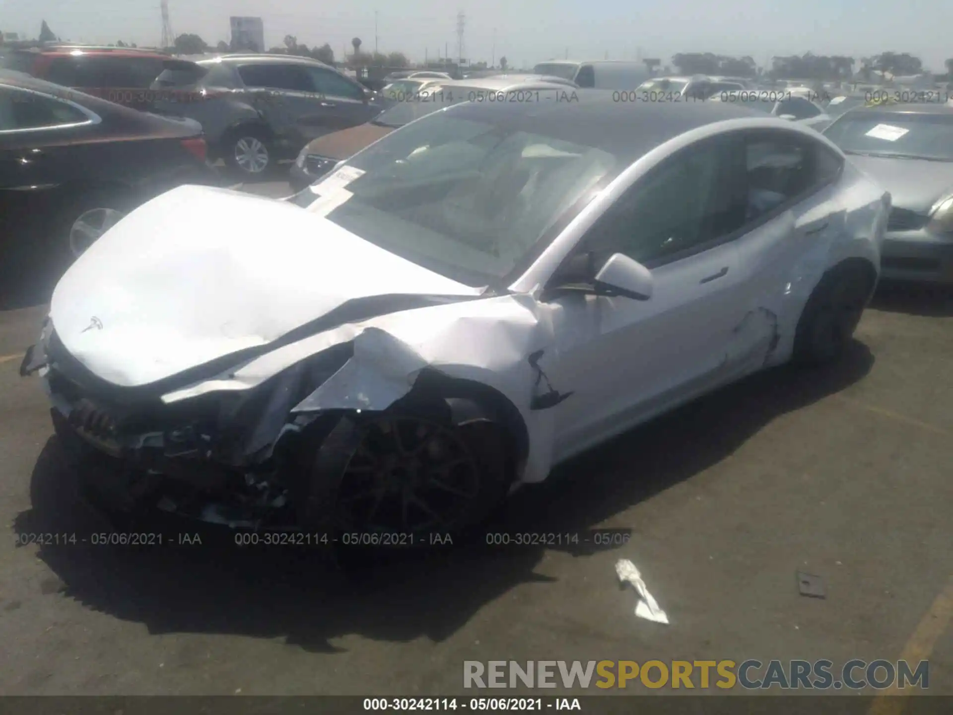 2 Photograph of a damaged car 5YJ3E1EA7MF858871 TESLA MODEL 3 2021