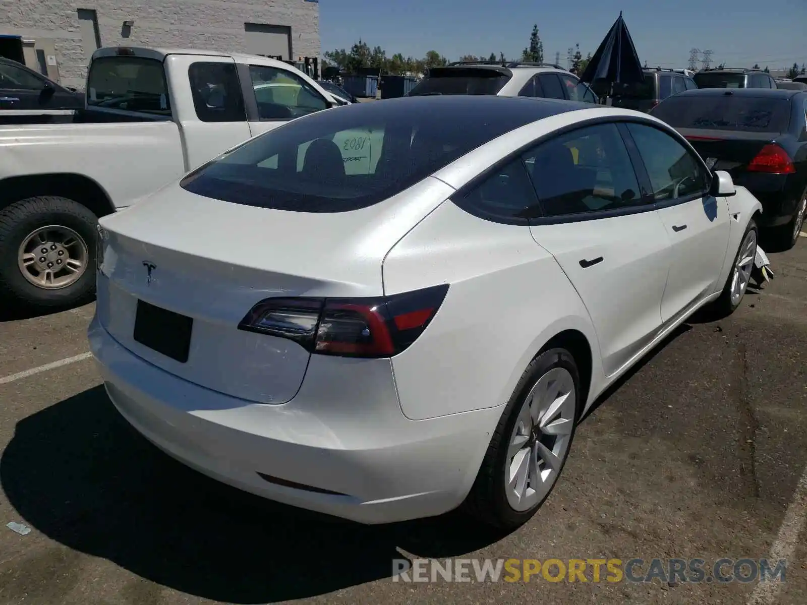 4 Photograph of a damaged car 5YJ3E1EA7MF908314 TESLA MODEL 3 2021