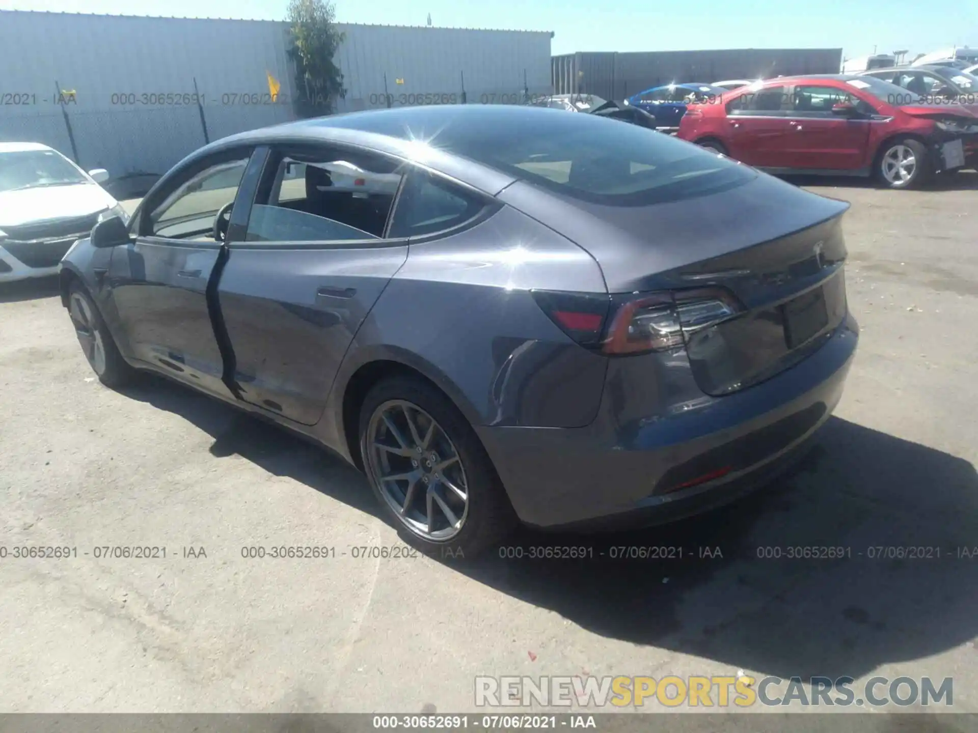 3 Photograph of a damaged car 5YJ3E1EA7MF929583 TESLA MODEL 3 2021