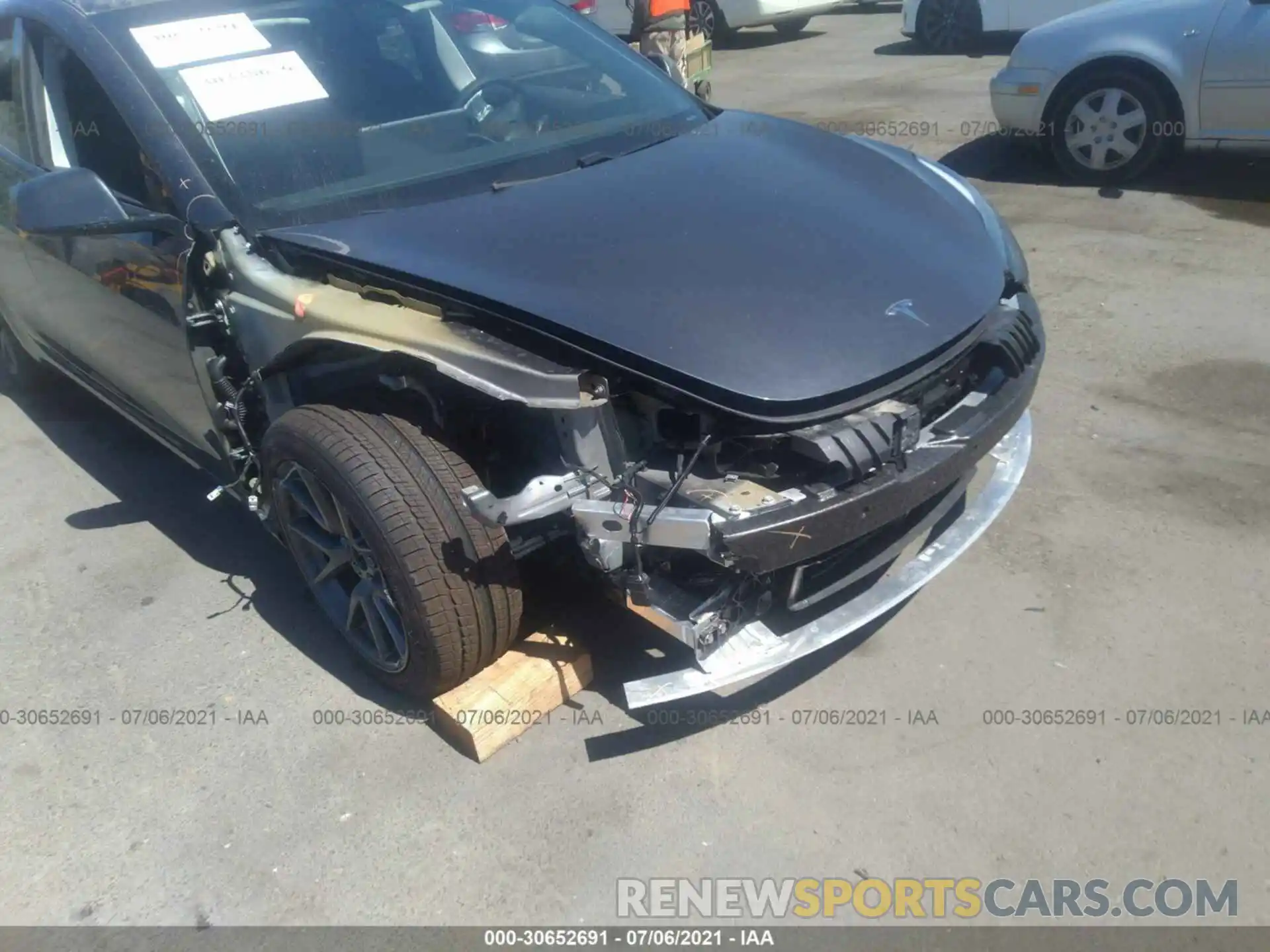 6 Photograph of a damaged car 5YJ3E1EA7MF929583 TESLA MODEL 3 2021