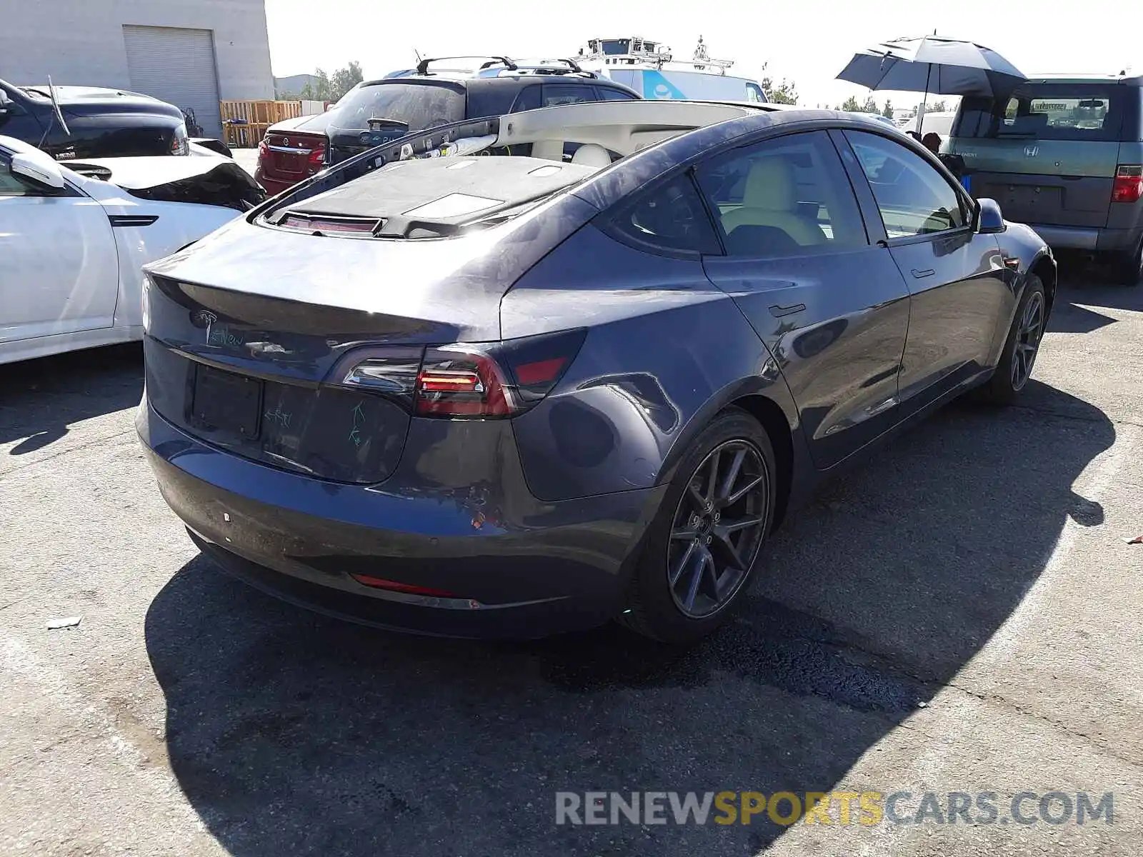 4 Photograph of a damaged car 5YJ3E1EA7MF938641 TESLA MODEL 3 2021