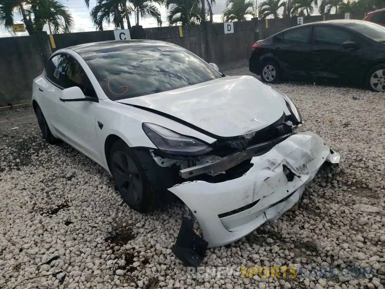 1 Photograph of a damaged car 5YJ3E1EA7MF973406 TESLA MODEL 3 2021