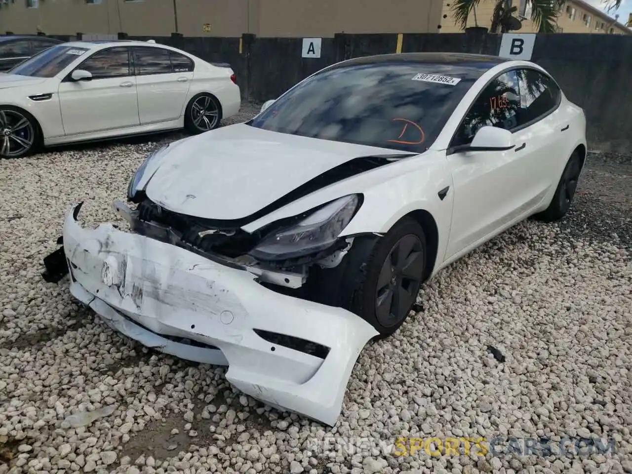 2 Photograph of a damaged car 5YJ3E1EA7MF973406 TESLA MODEL 3 2021