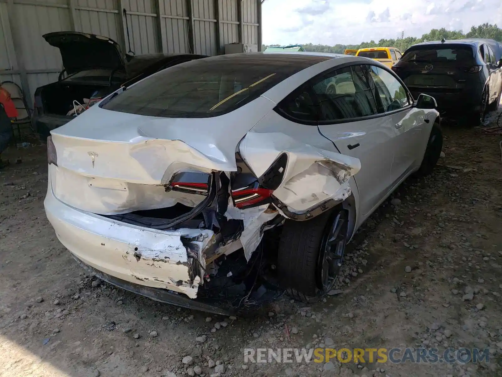 4 Photograph of a damaged car 5YJ3E1EA7MF981795 TESLA MODEL 3 2021