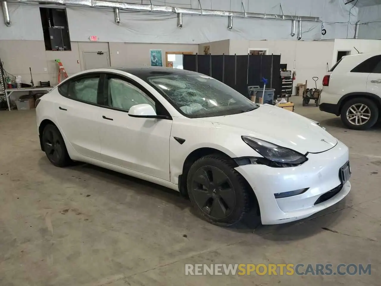4 Photograph of a damaged car 5YJ3E1EA7MF986964 TESLA MODEL 3 2021