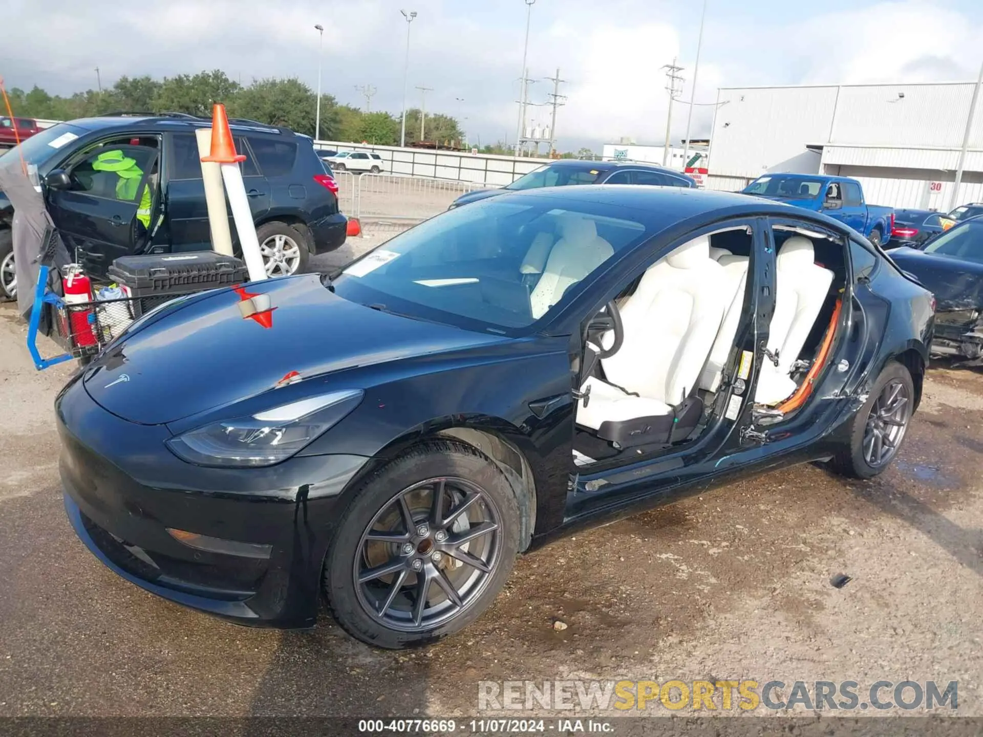 2 Photograph of a damaged car 5YJ3E1EA7MF987340 TESLA MODEL 3 2021