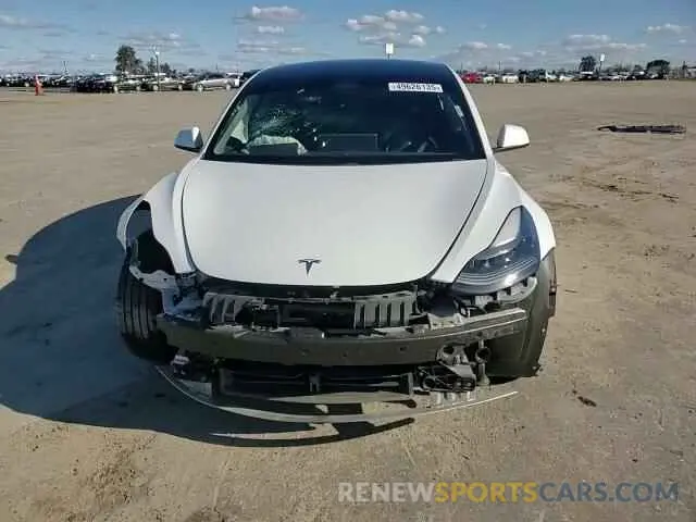 12 Photograph of a damaged car 5YJ3E1EA8MF074974 TESLA MODEL 3 2021