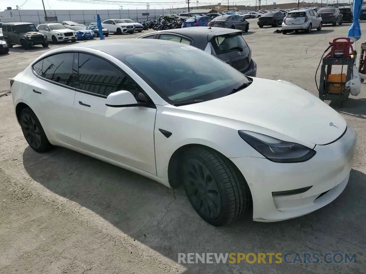 4 Photograph of a damaged car 5YJ3E1EA8MF098935 TESLA MODEL 3 2021