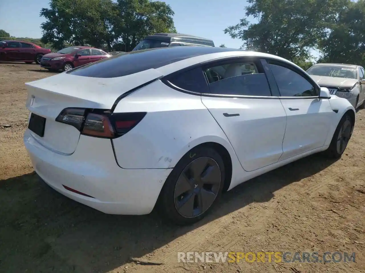 4 Photograph of a damaged car 5YJ3E1EA8MF848382 TESLA MODEL 3 2021