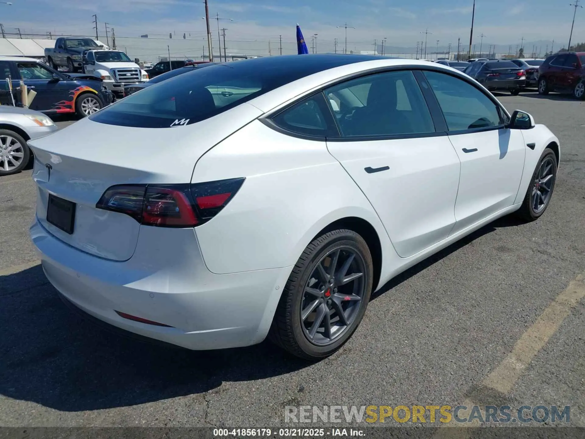 4 Photograph of a damaged car 5YJ3E1EA8MF867790 TESLA MODEL 3 2021