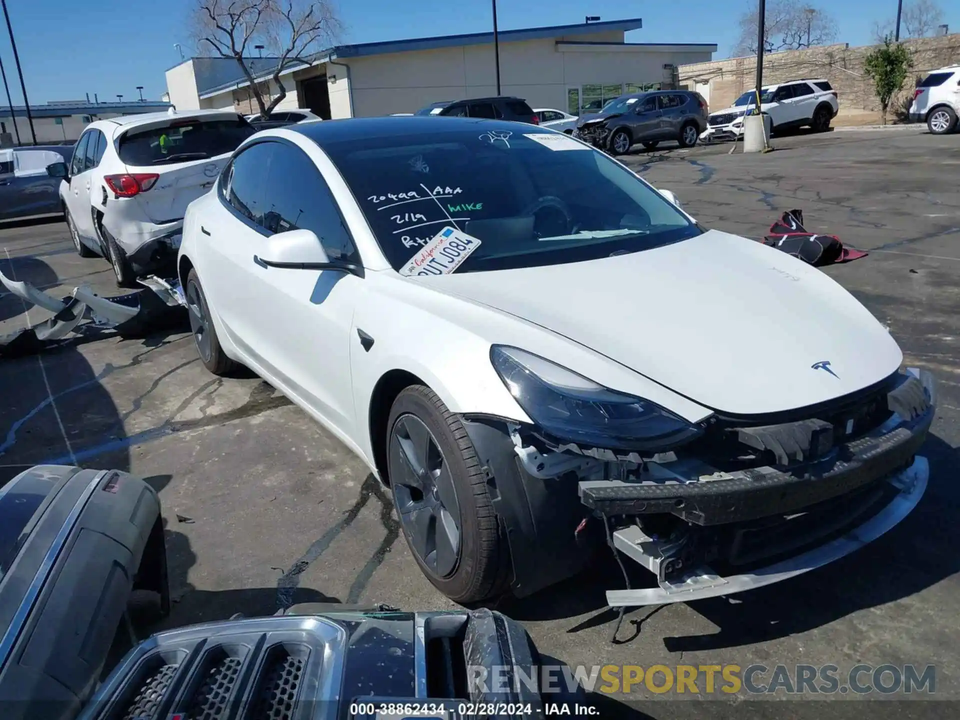 1 Photograph of a damaged car 5YJ3E1EA8MF878739 TESLA MODEL 3 2021