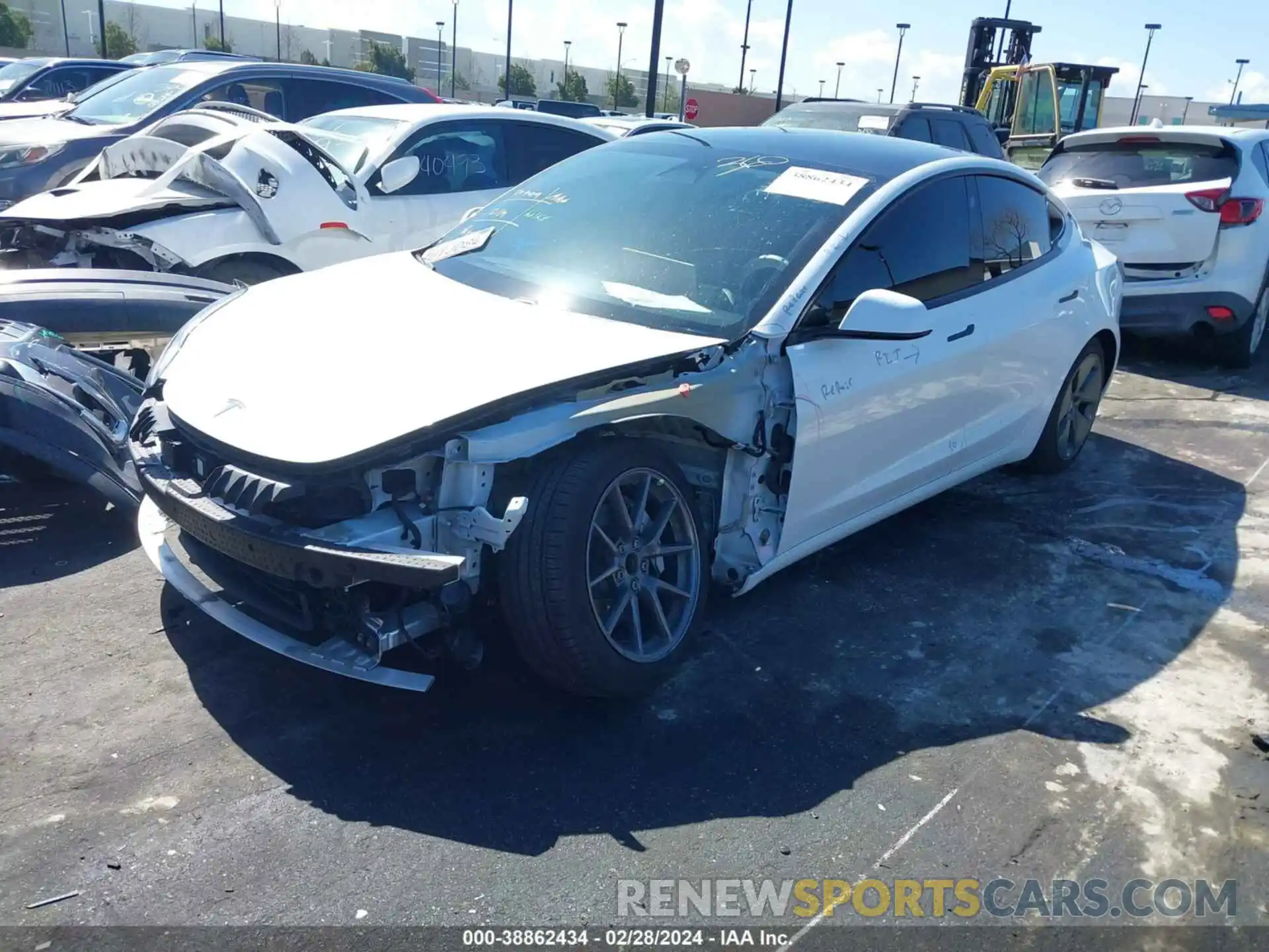 2 Photograph of a damaged car 5YJ3E1EA8MF878739 TESLA MODEL 3 2021