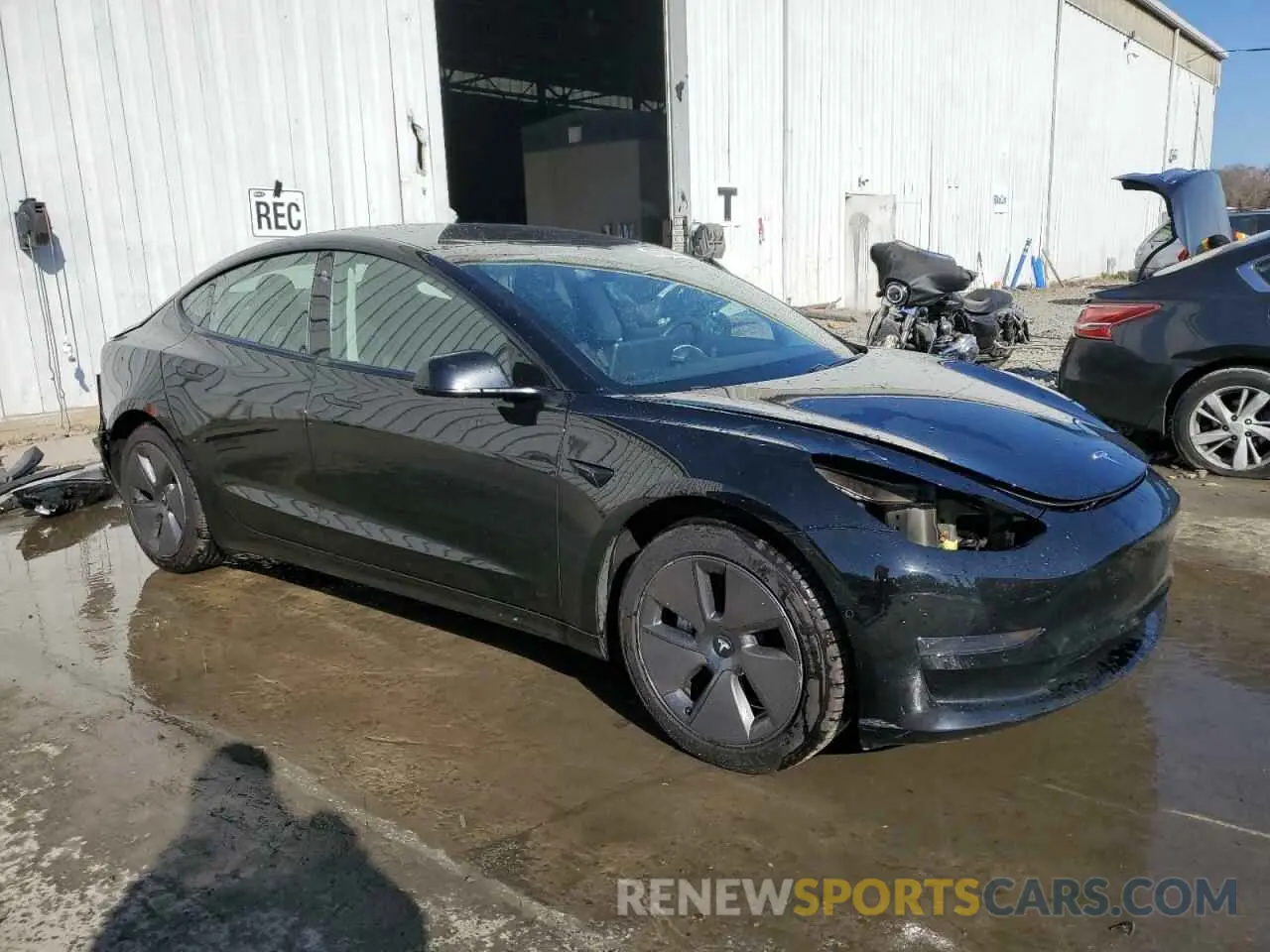 4 Photograph of a damaged car 5YJ3E1EA8MF907060 TESLA MODEL 3 2021