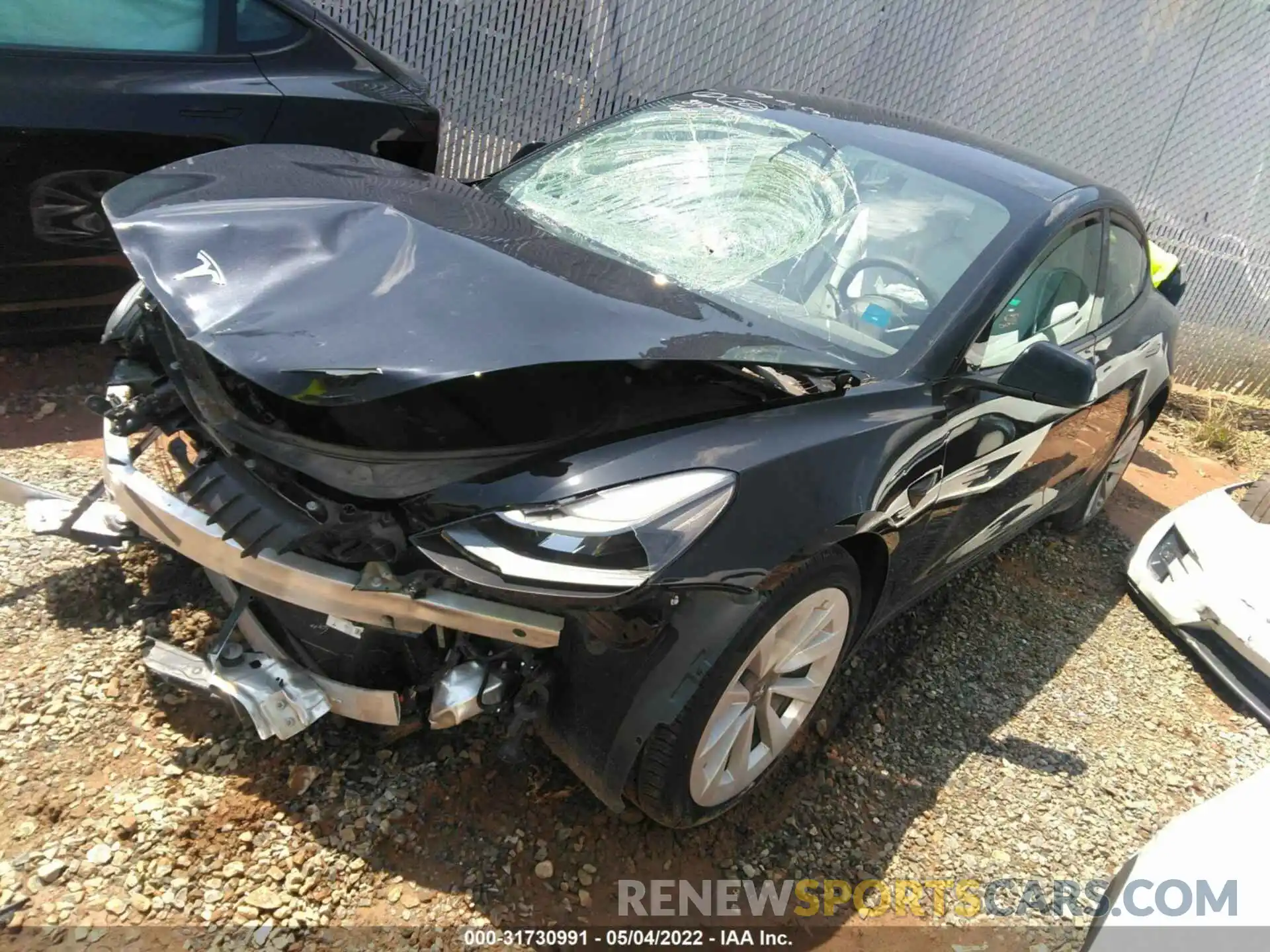 2 Photograph of a damaged car 5YJ3E1EA8MF921850 TESLA MODEL 3 2021