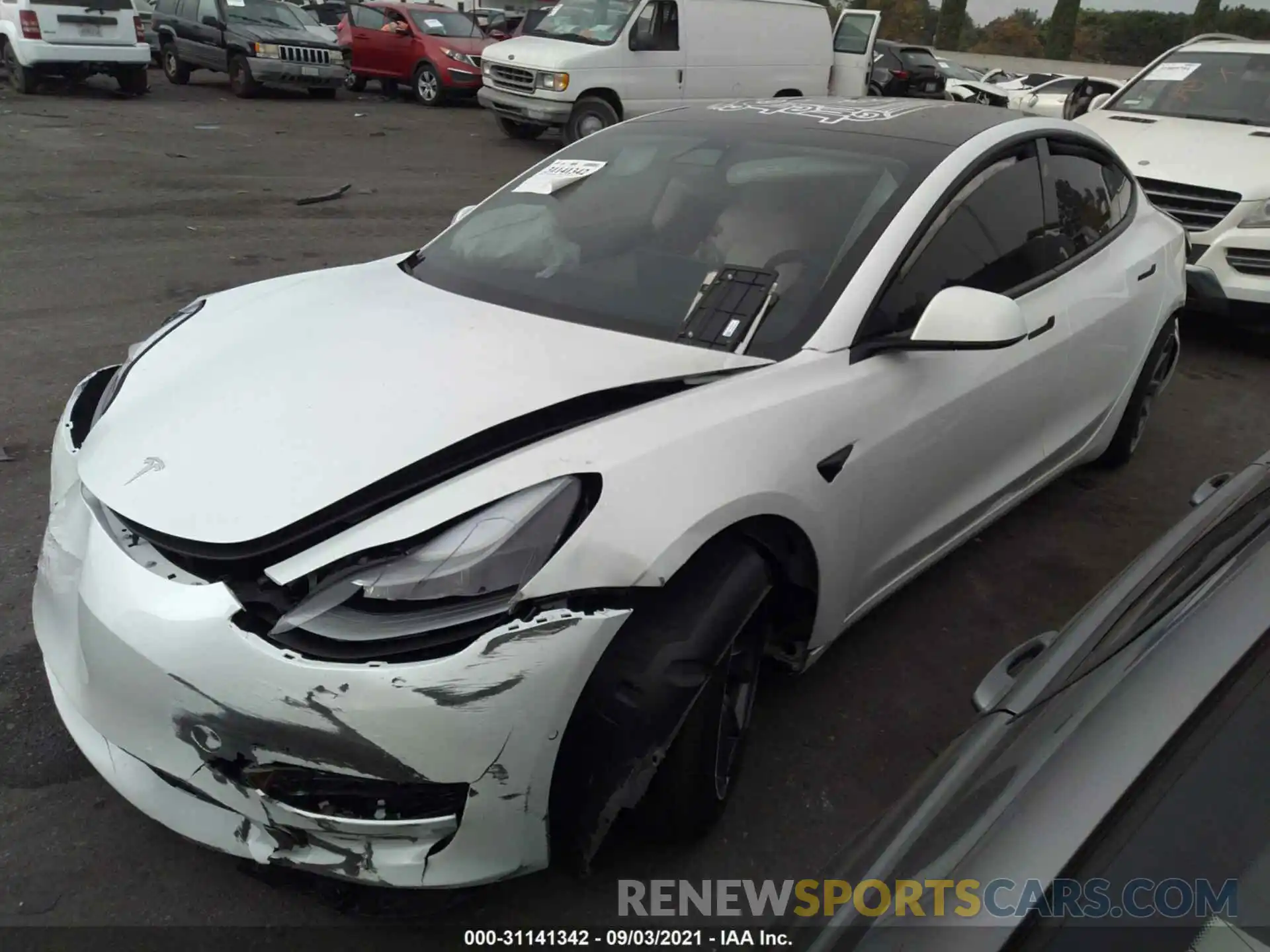 2 Photograph of a damaged car 5YJ3E1EA8MF928863 TESLA MODEL 3 2021