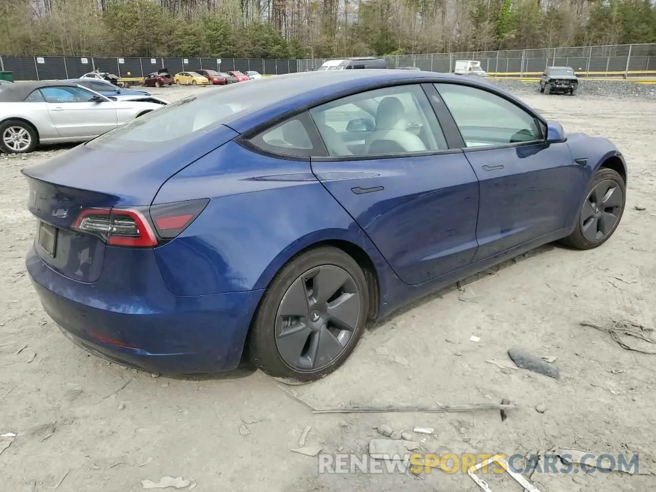 3 Photograph of a damaged car 5YJ3E1EA8MF973141 TESLA MODEL 3 2021