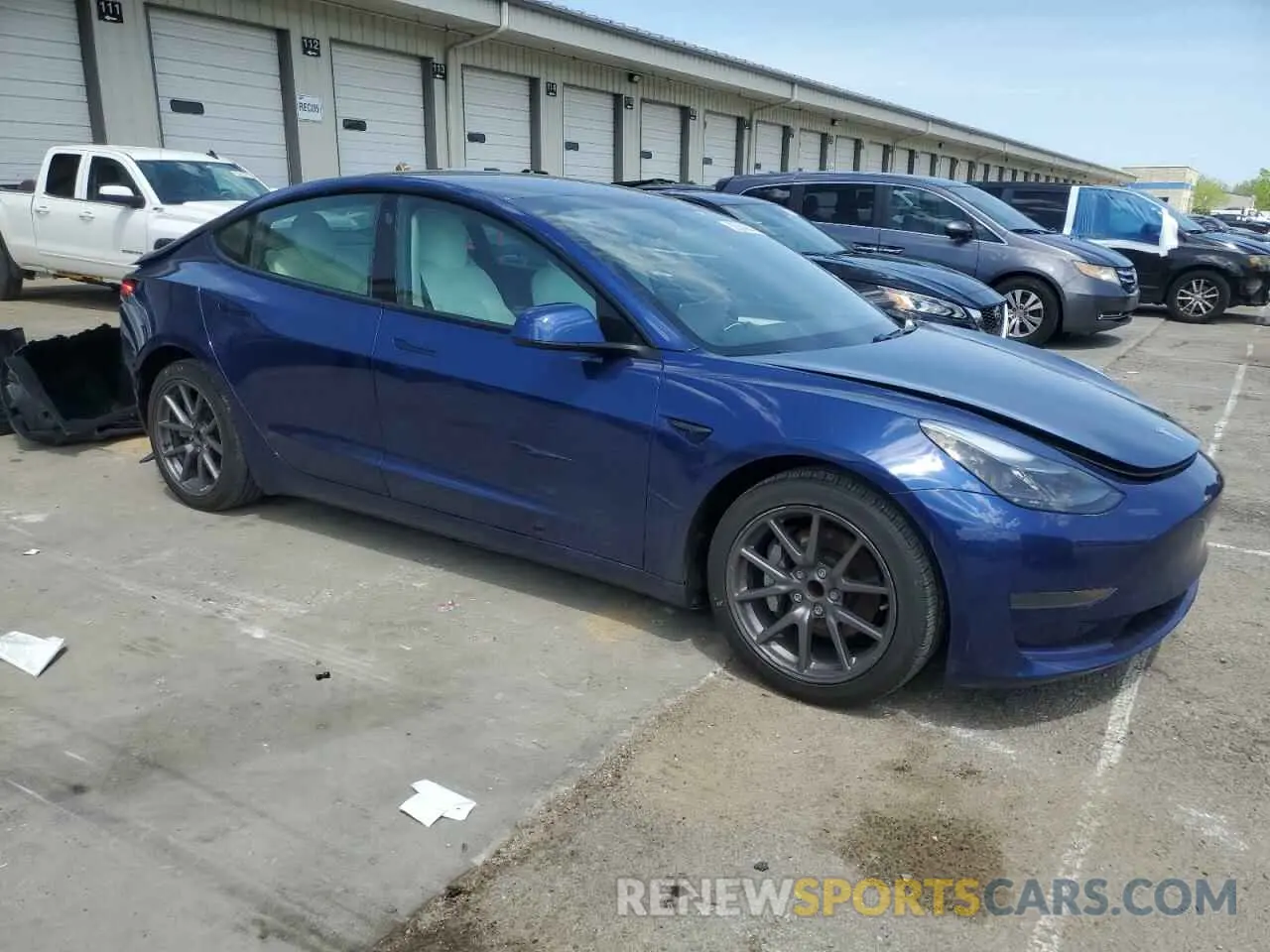 4 Photograph of a damaged car 5YJ3E1EA8MF978274 TESLA MODEL 3 2021