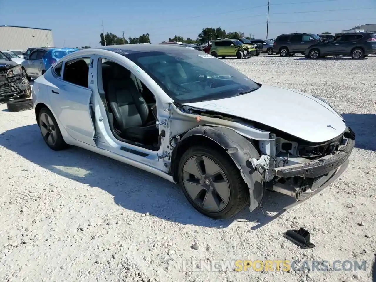 4 Photograph of a damaged car 5YJ3E1EA8MF982227 TESLA MODEL 3 2021