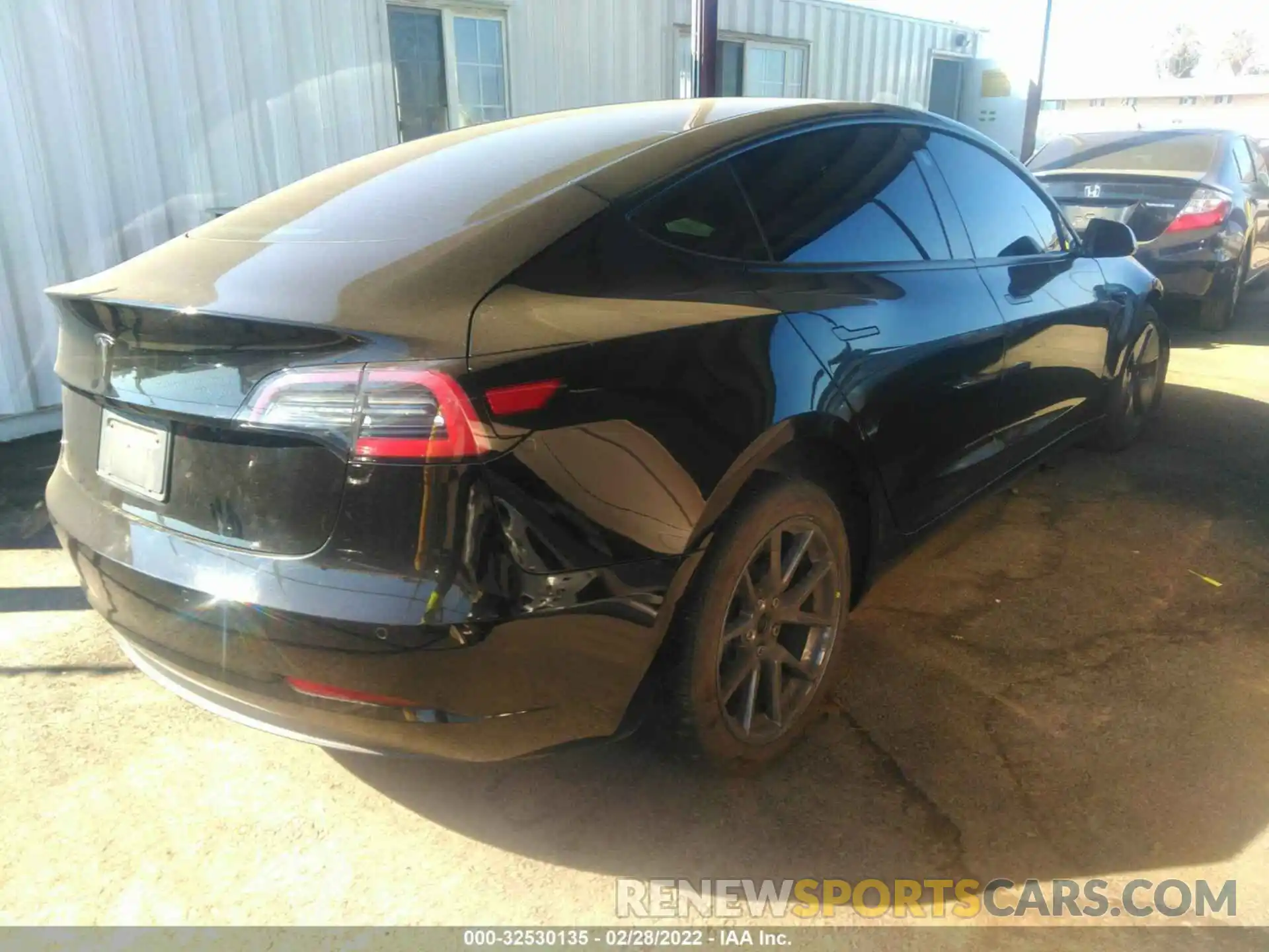 4 Photograph of a damaged car 5YJ3E1EA8MF992420 TESLA MODEL 3 2021