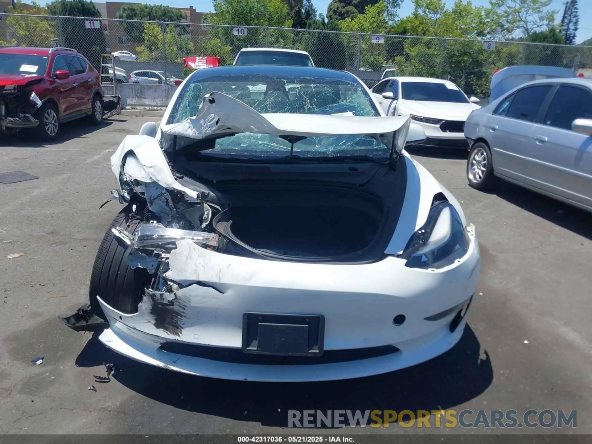 12 Photograph of a damaged car 5YJ3E1EA9MF001936 TESLA MODEL 3 2021