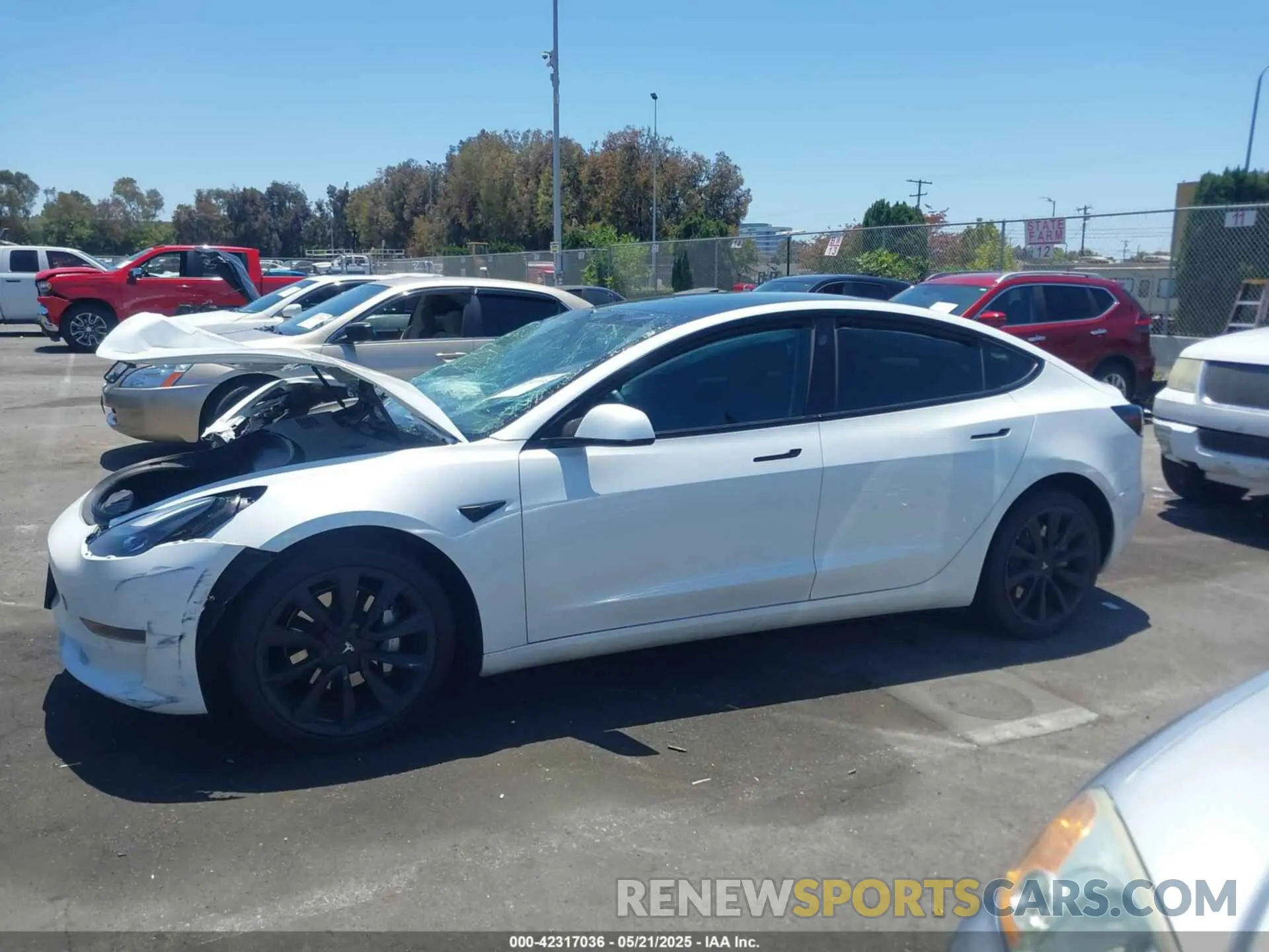 14 Photograph of a damaged car 5YJ3E1EA9MF001936 TESLA MODEL 3 2021