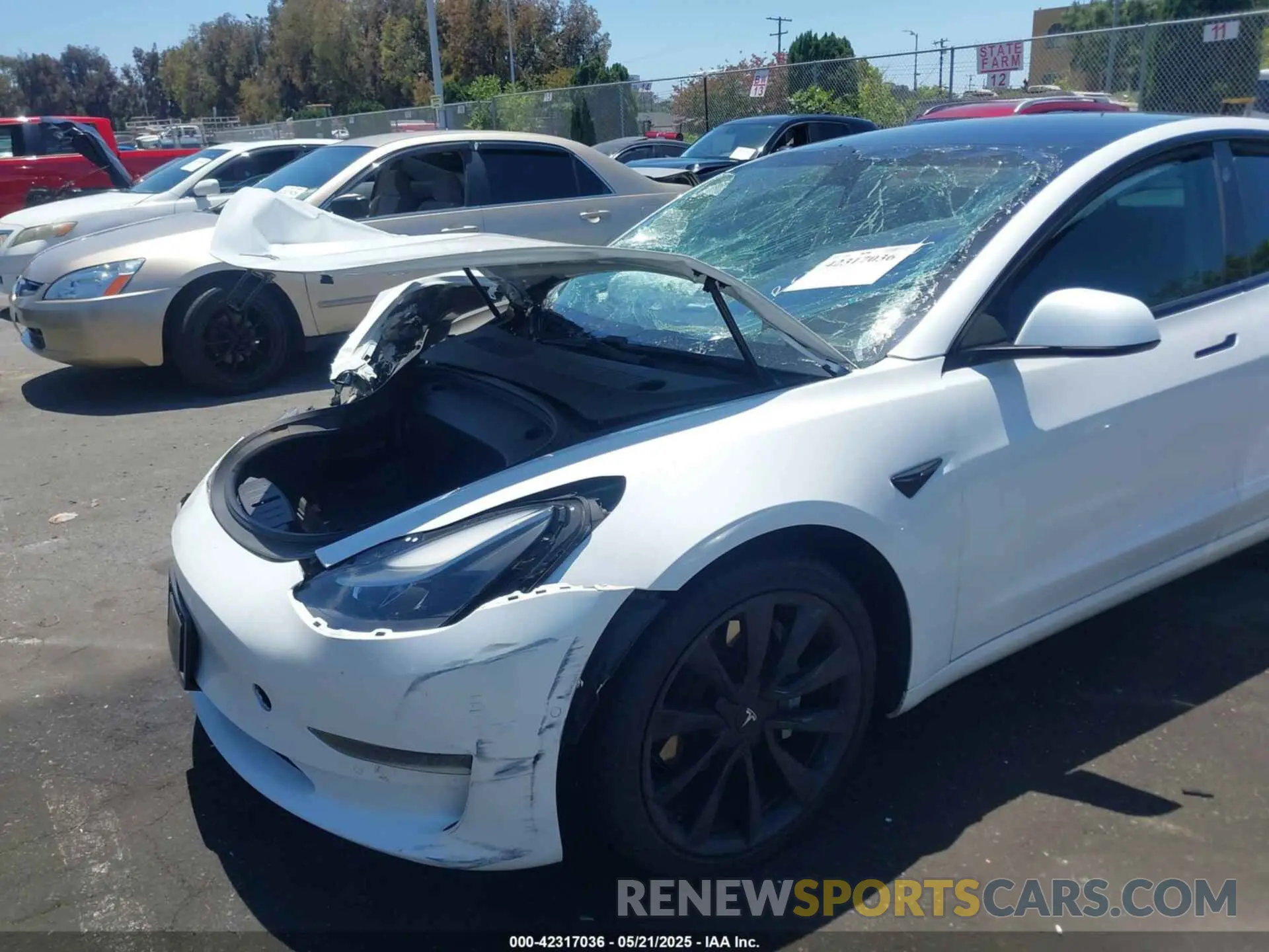 19 Photograph of a damaged car 5YJ3E1EA9MF001936 TESLA MODEL 3 2021