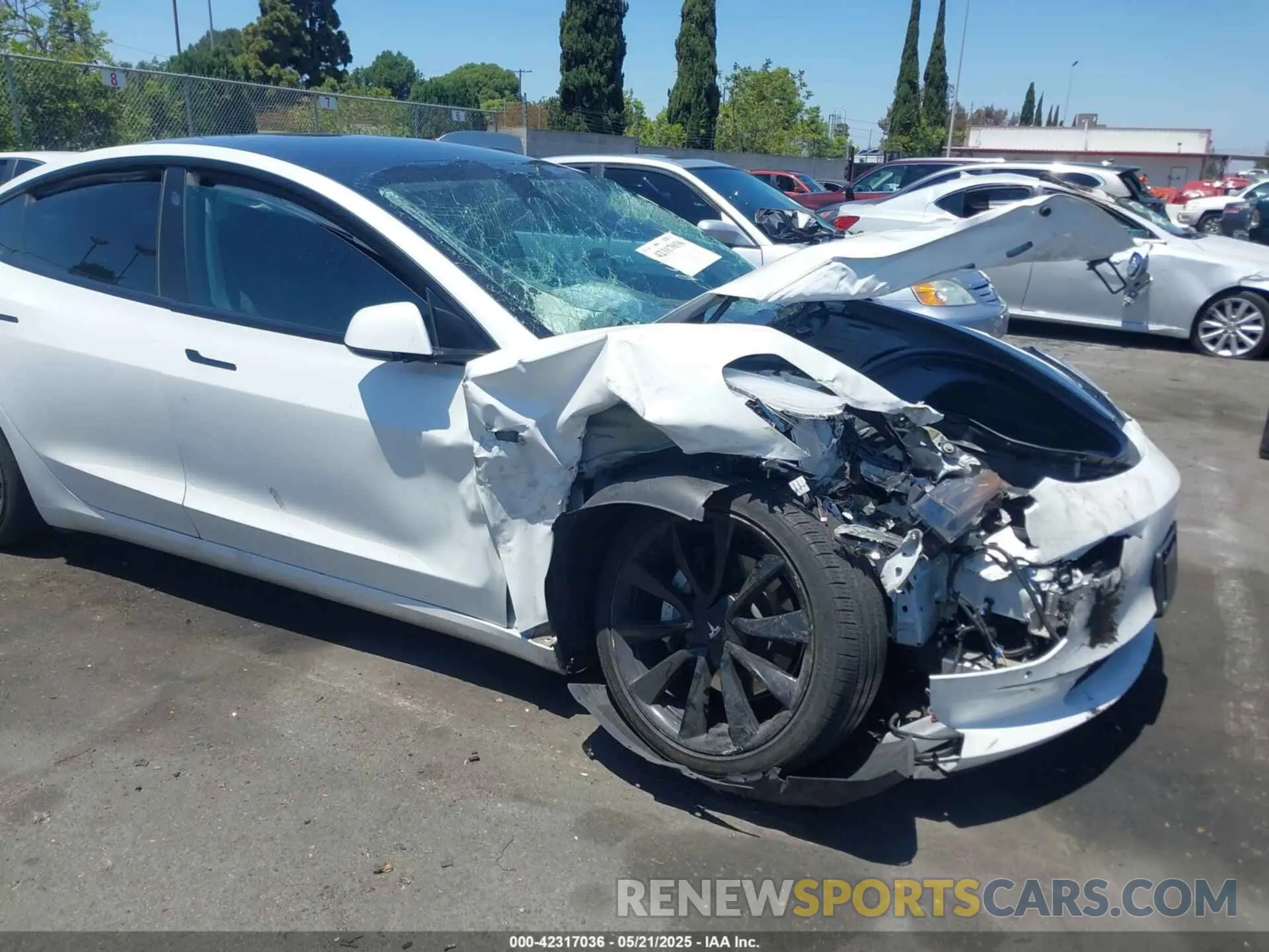 6 Photograph of a damaged car 5YJ3E1EA9MF001936 TESLA MODEL 3 2021