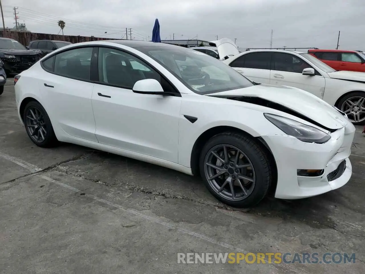 4 Photograph of a damaged car 5YJ3E1EA9MF017537 TESLA MODEL 3 2021