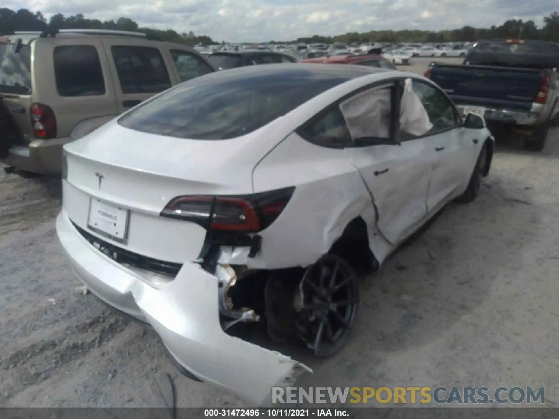 4 Photograph of a damaged car 5YJ3E1EA9MF041496 TESLA MODEL 3 2021