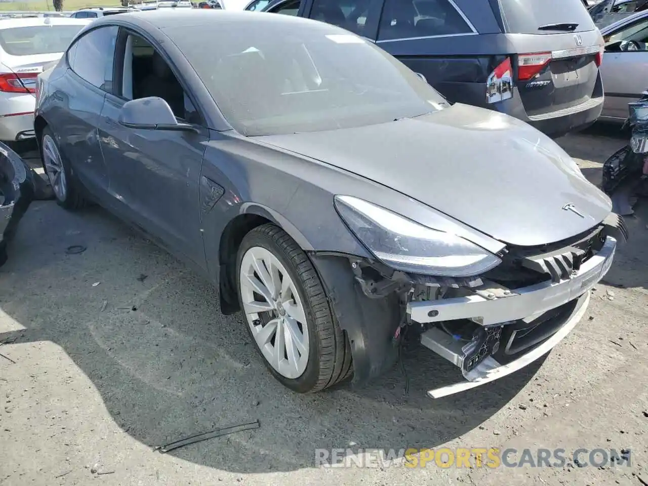 4 Photograph of a damaged car 5YJ3E1EA9MF071050 TESLA MODEL 3 2021