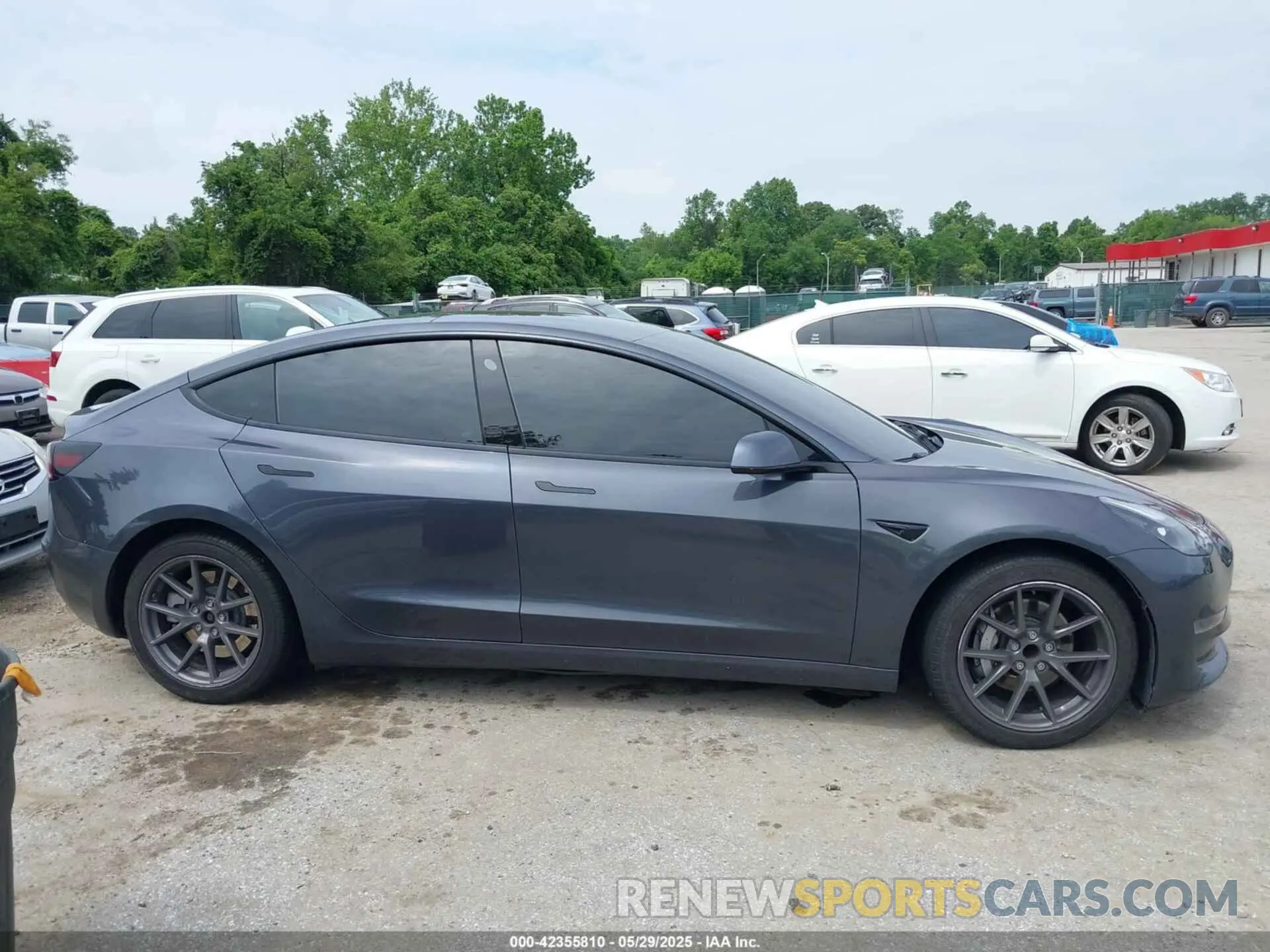12 Photograph of a damaged car 5YJ3E1EA9MF094554 TESLA MODEL 3 2021