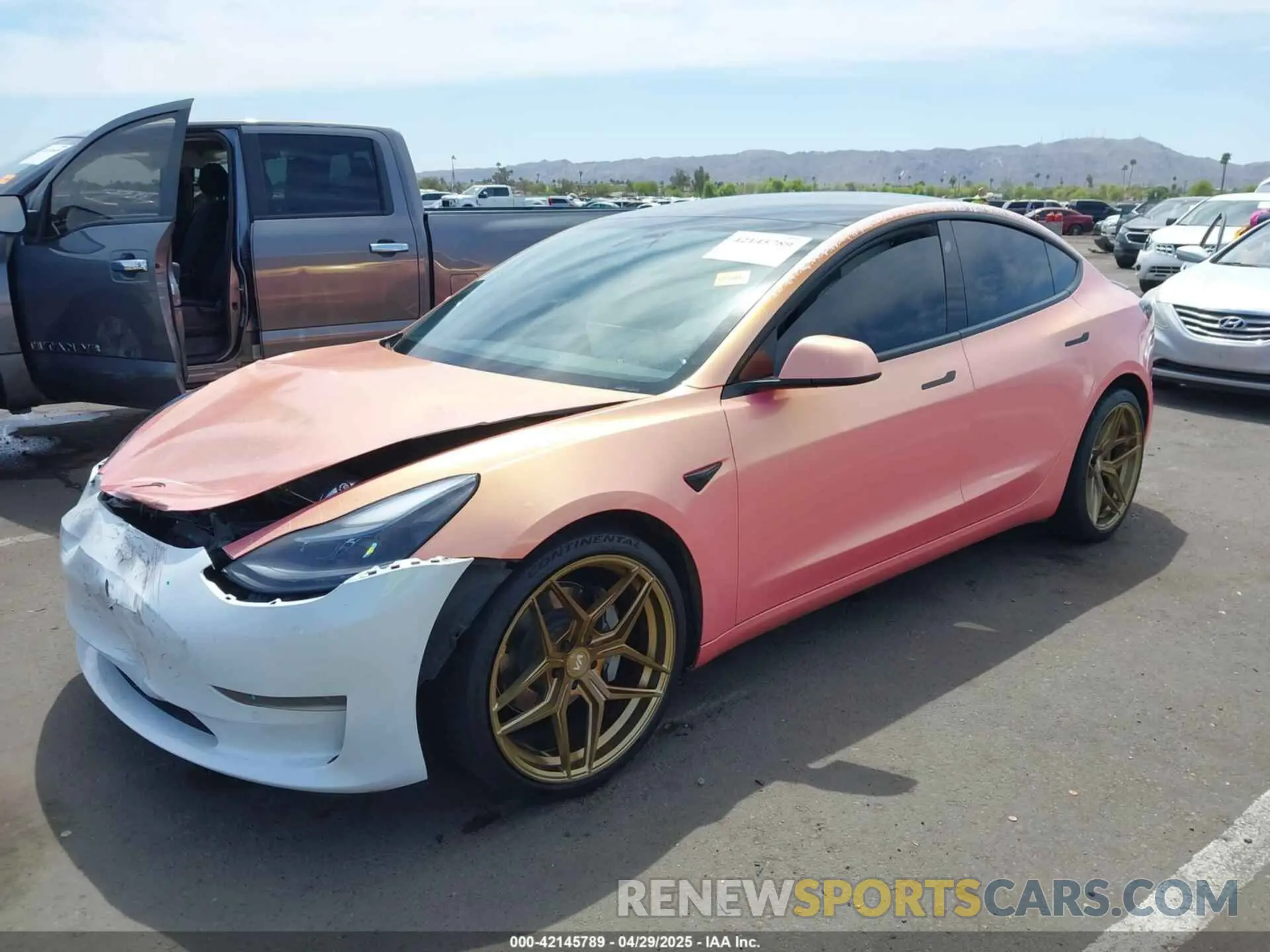 2 Photograph of a damaged car 5YJ3E1EA9MF097437 TESLA MODEL 3 2021