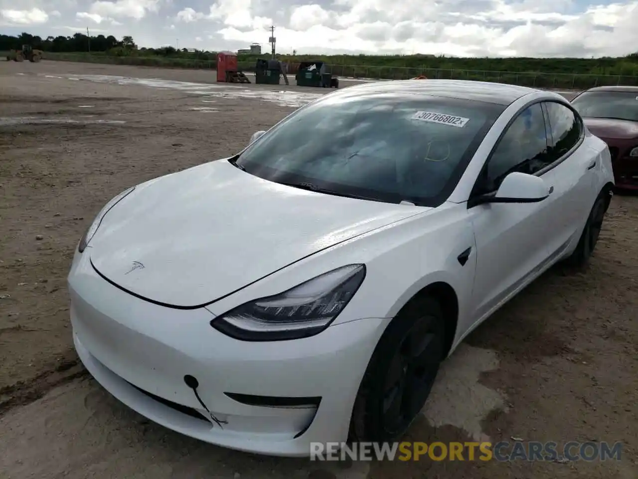 2 Photograph of a damaged car 5YJ3E1EA9MF848374 TESLA MODEL 3 2021