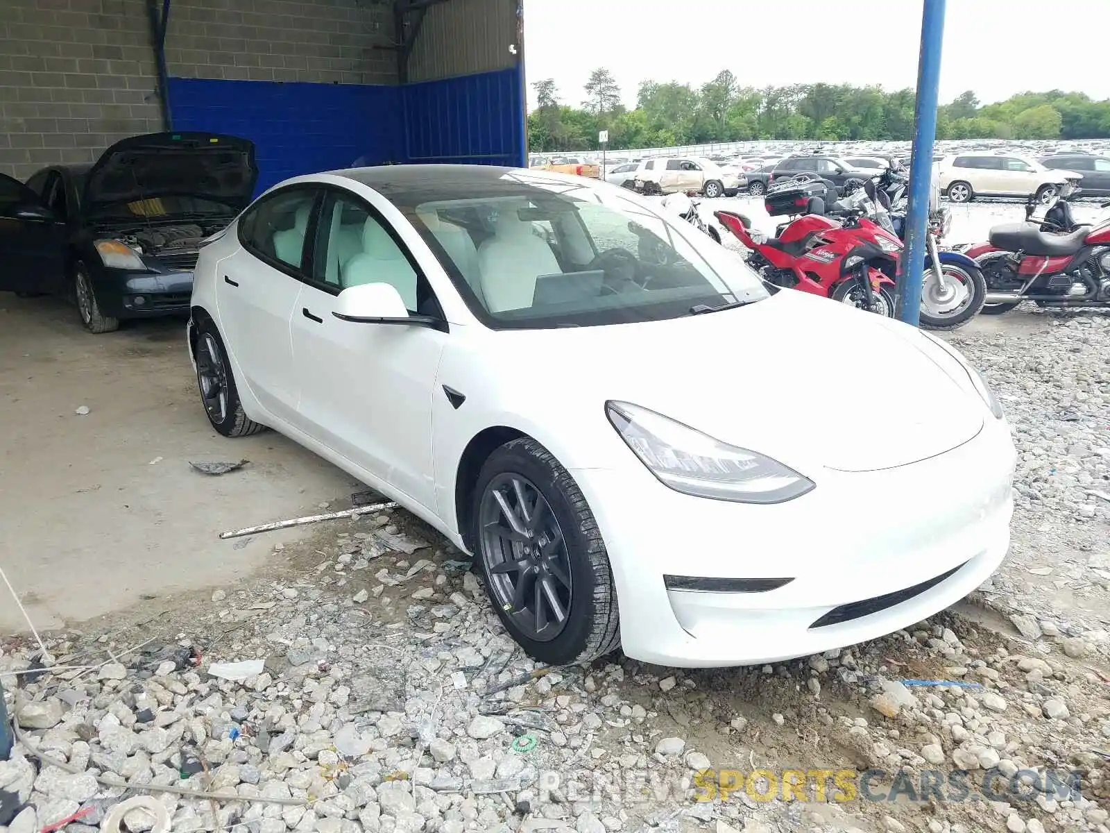 1 Photograph of a damaged car 5YJ3E1EA9MF853784 TESLA MODEL 3 2021