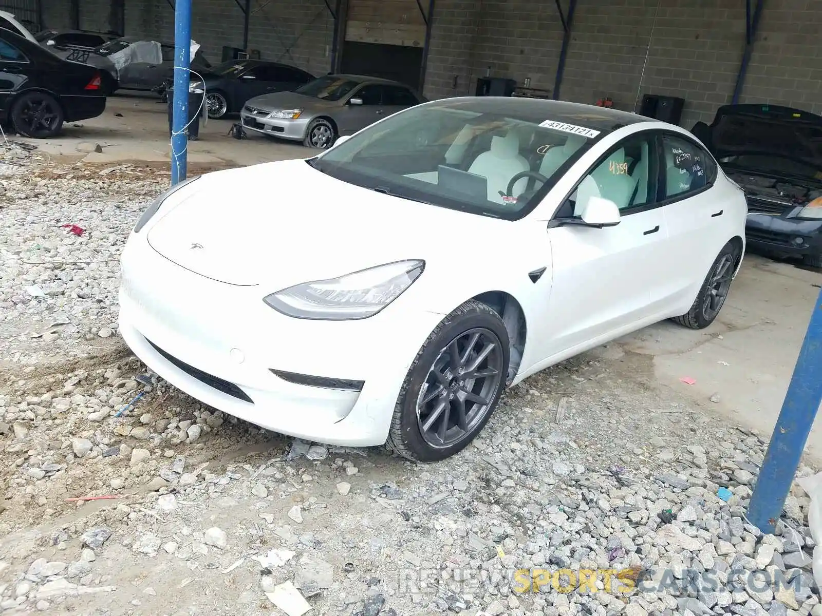 2 Photograph of a damaged car 5YJ3E1EA9MF853784 TESLA MODEL 3 2021