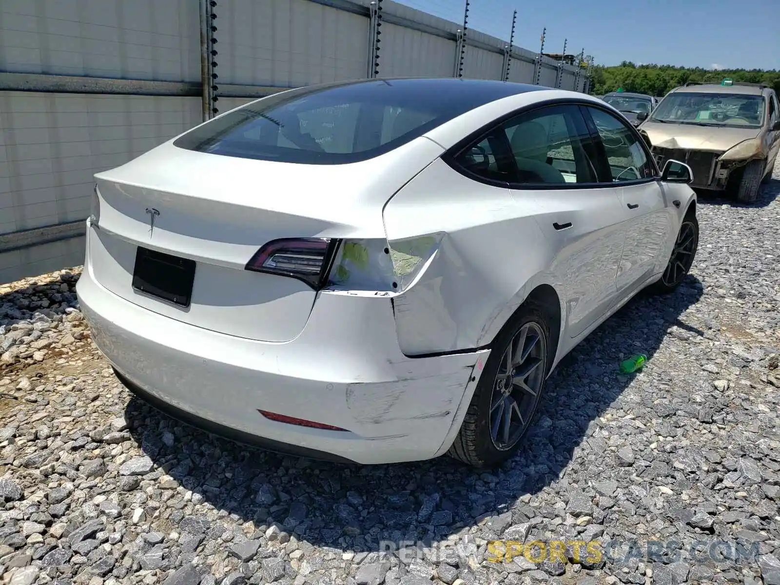 4 Photograph of a damaged car 5YJ3E1EA9MF853784 TESLA MODEL 3 2021