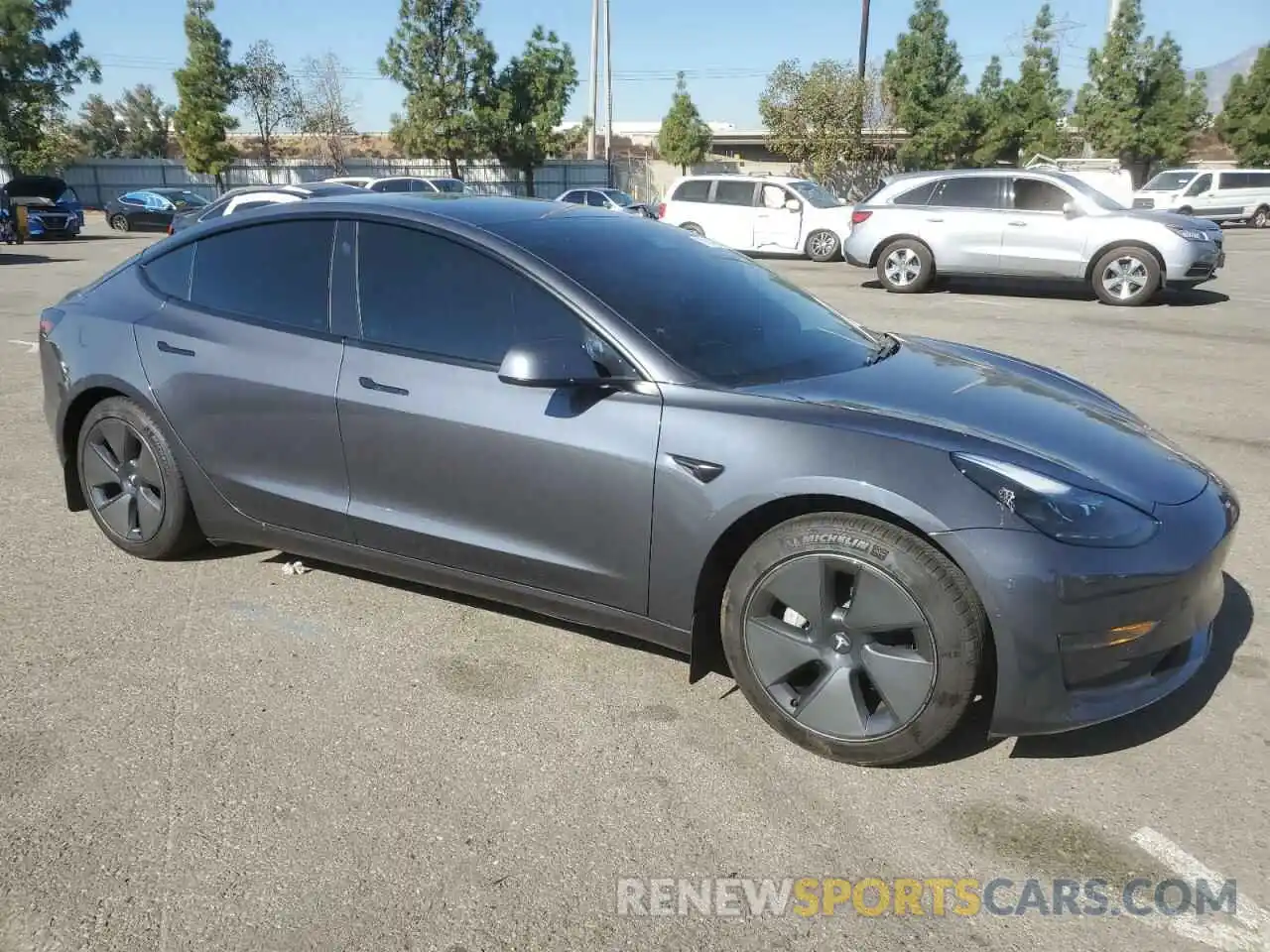 4 Photograph of a damaged car 5YJ3E1EA9MF867541 TESLA MODEL 3 2021